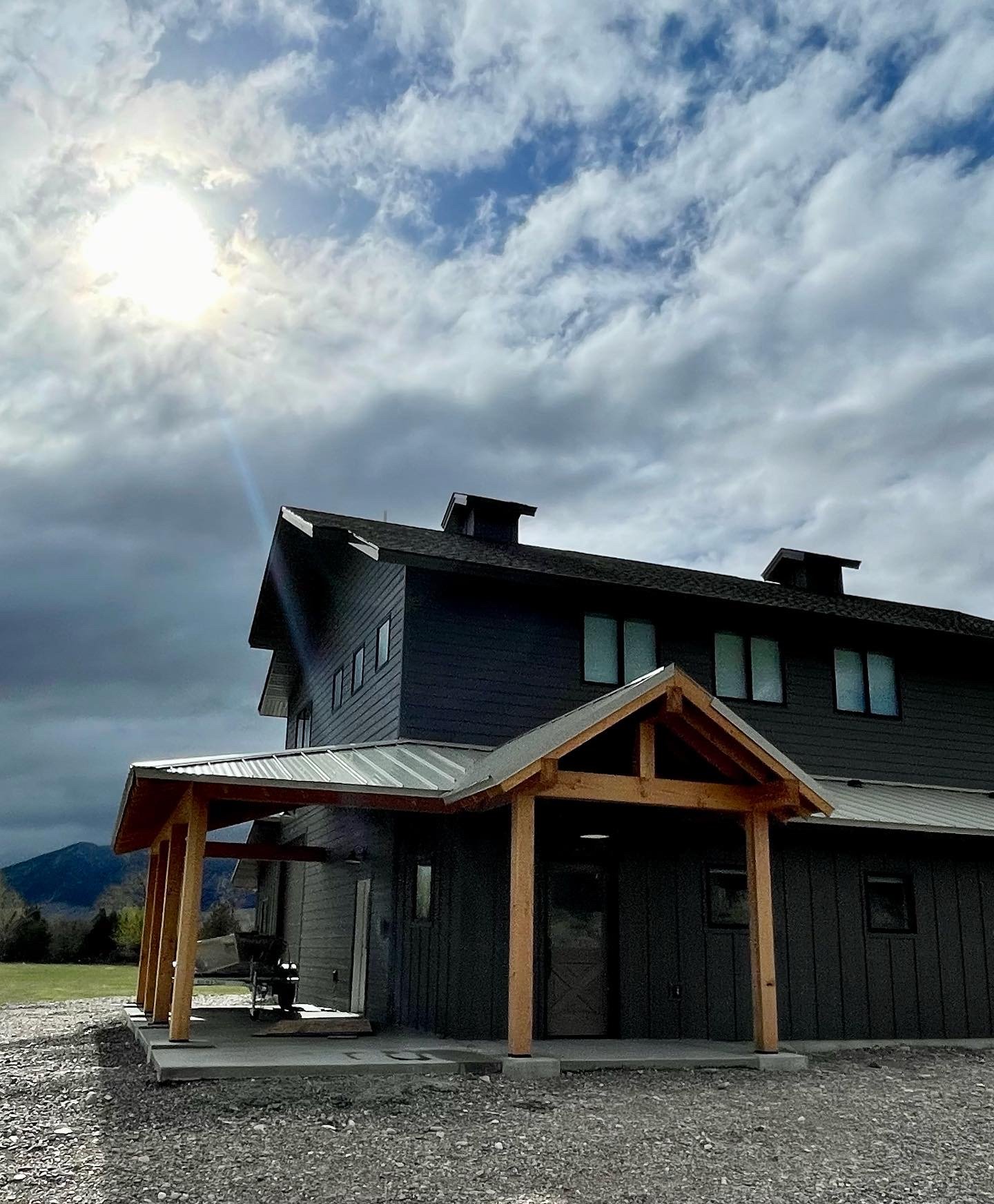 Modern farmhouse barndominium design meets Montana mountain living — custom built by Mihelich Custom Builders in Silver Star, MT.