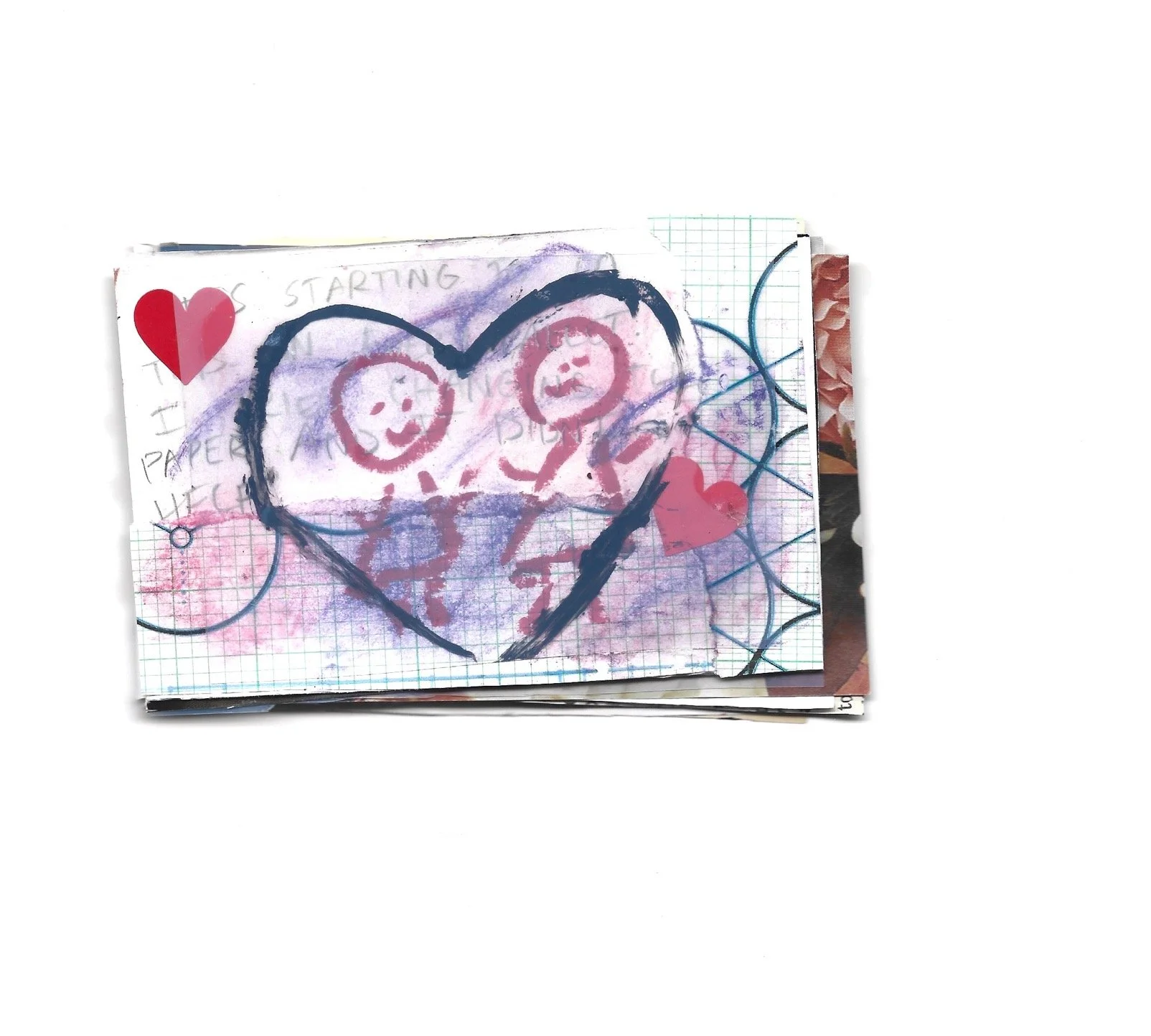 Handmade card with a large heart outline, a drawing of two smiling faces inside the heart, surrounded by pink and red hearts, on lined and graph paper background.