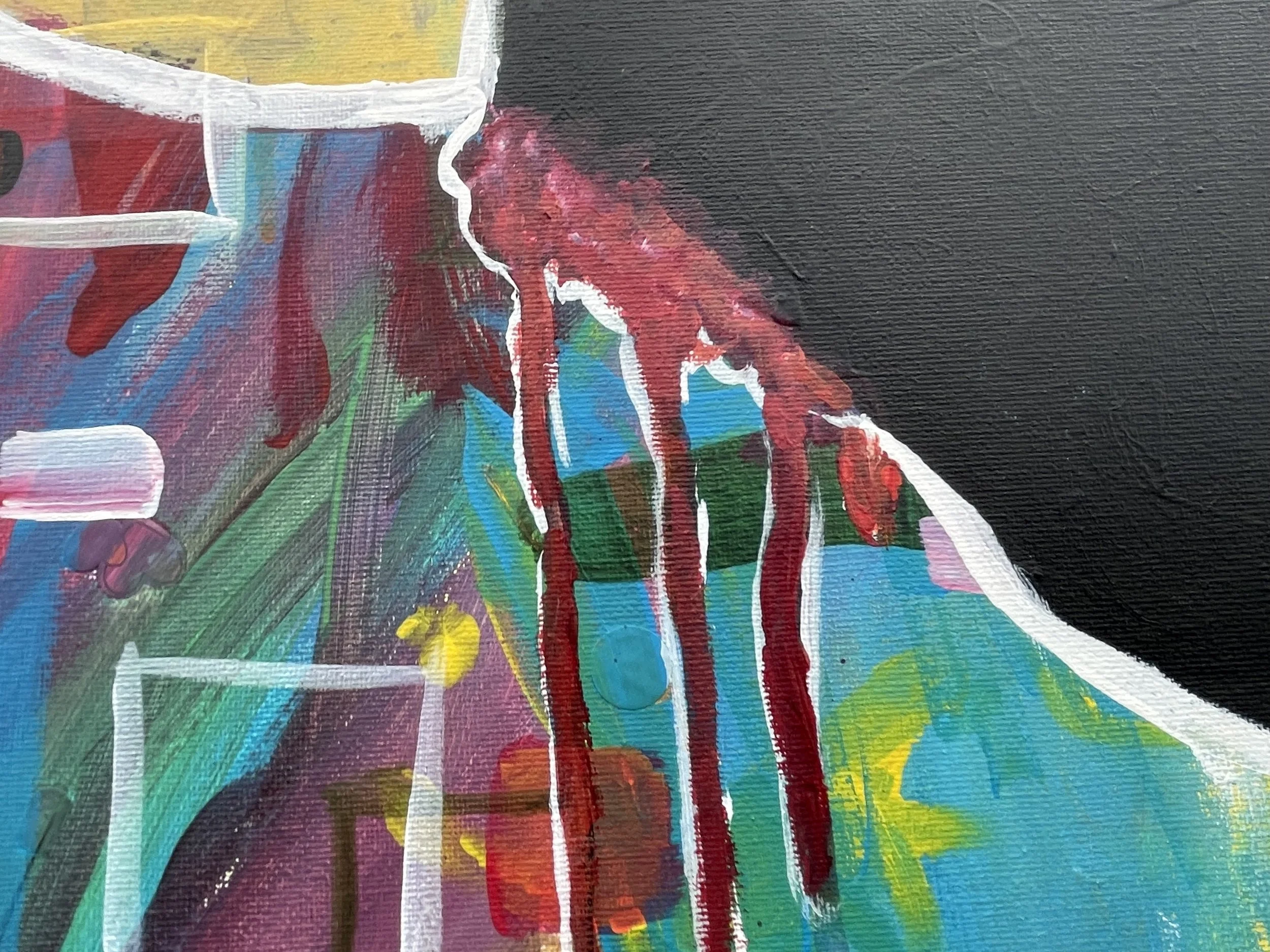 Close-up of an abstract painting with vibrant colors, including red, blue, green, yellow, and pink, using bold brushstrokes and drips of red paint.