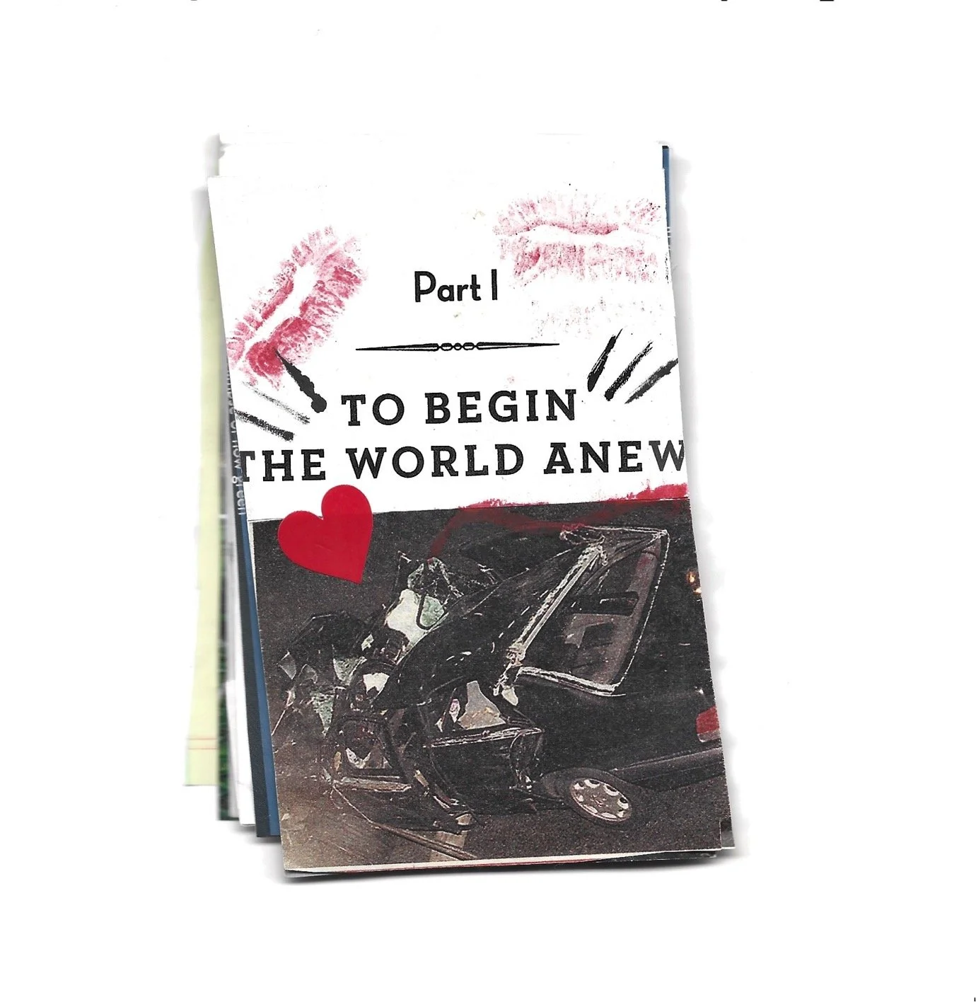 Booklet with the title 'Part 1 To Begin the World Anew' featuring a photograph of a damaged black car and red lipstick marks, along with a red heart graphic.
