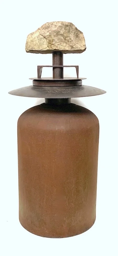 Unearthed - Inspired by archeology and digging up beautiful rocks. Welded steel, rock. 36” x 17” x 17”. 2021