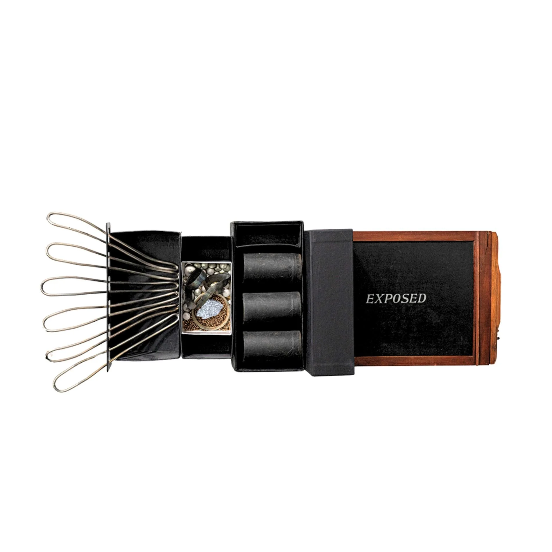 Expose - To uncover, reveal or make visible that which is hidden.This is one of the pieces in the Covid series. Vintage camera equipment, cardboard tubes, stainless steel, beads, silica ore. 16.5” x 20” x 4”.  2020