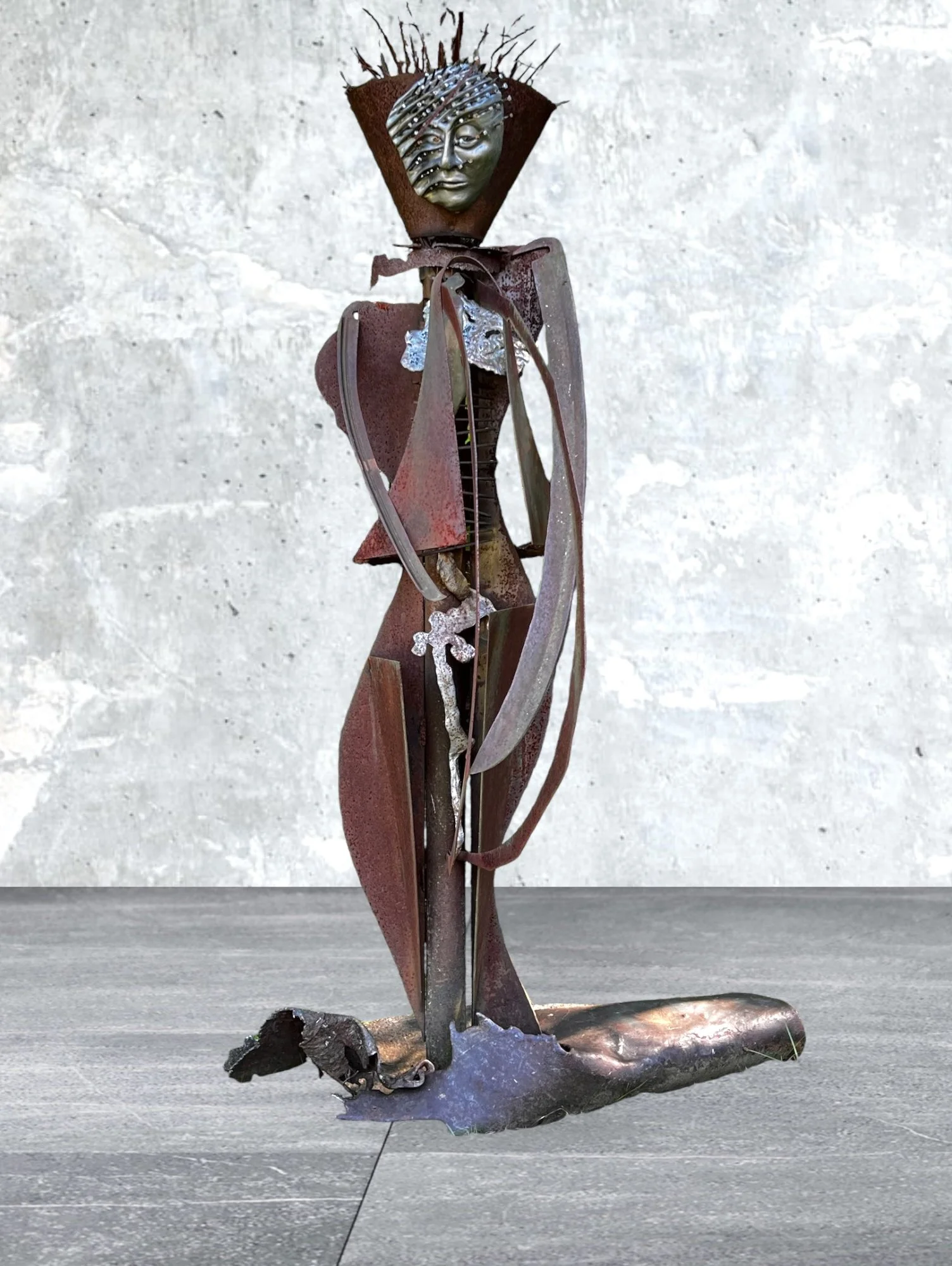 Agrarian  - Inspired by the agrarian way of life in the rural upstate NY. Much of the steel in my collection has come from abandoned farms and outdated farm equipment. Welded salvaged steel, modeled clay face with horse
shoe nails. 8’5” x 3’ x 3’ ( a