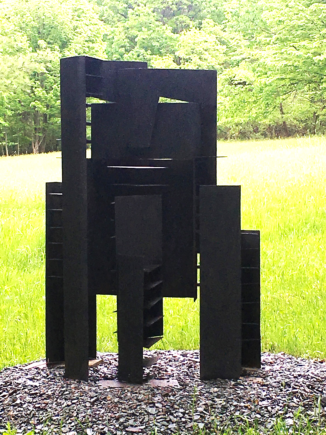Shifting Planes - A formal construction influenced by positive & negative areas. Welded & painted steel. 65” x 48” x 36”. 1885