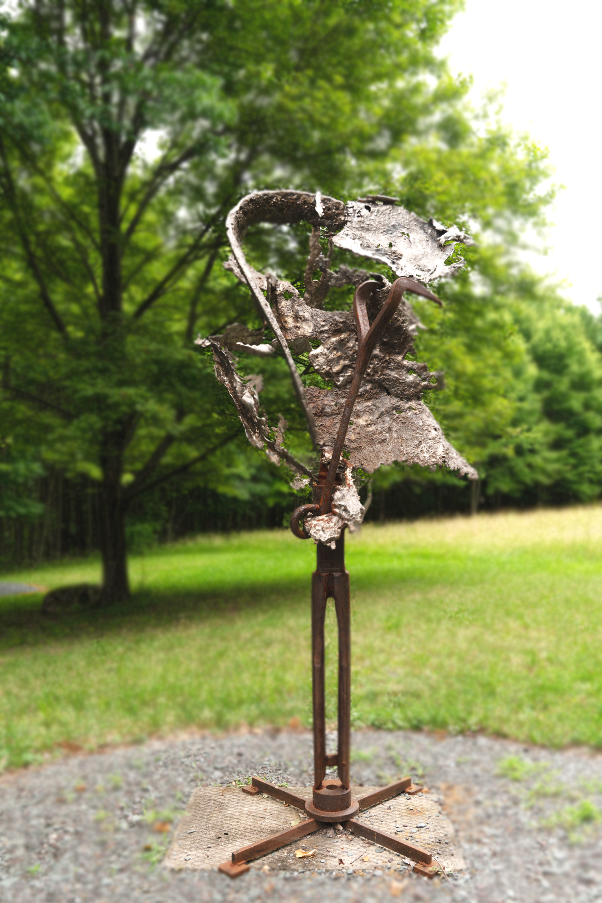 Torrential  - Inspired by the overwhelming intensity of wind and rain. Welded steel, cast stainless, vintage hooks and drill auger. 84” x 34” x 34”. 2022