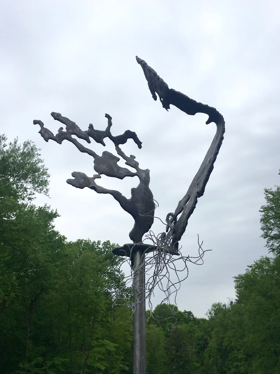 Sky Dancer - Inspired by sense of movement in the cast stainless forms Welded steel, cast stainless steel. 12’ x 30” x 30”. 1992