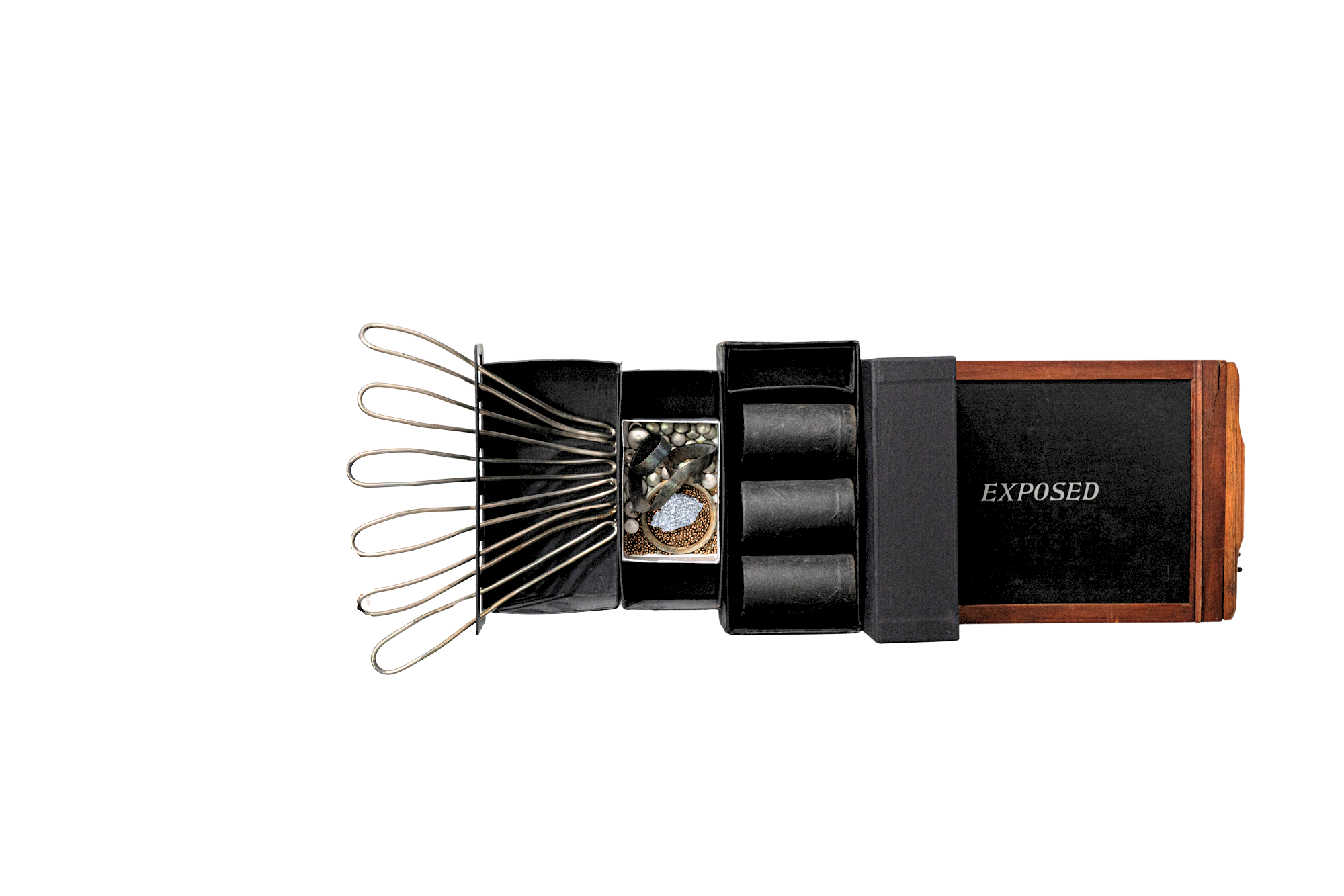 Expose - To uncover, reveal or make visible that which is hidden.This is one of the pieces in the Covid series. Vintage camera equipment, cardboard tubes, stainless steel, beads, silica ore. 16.5” x 20” x 4”.  2020