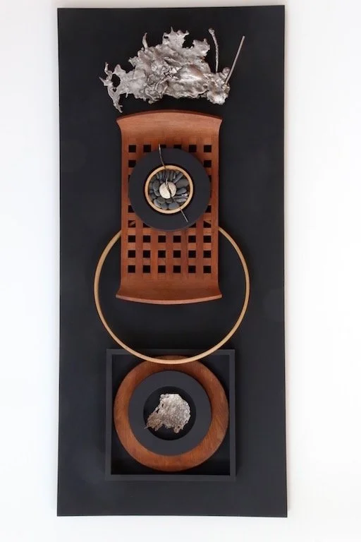 Transmigrate - Exploring the concept of passing from one state to another. Wood, cast stainless steel, steel, stones. 48” x 21” x 6.” 2017 (in a private collection)