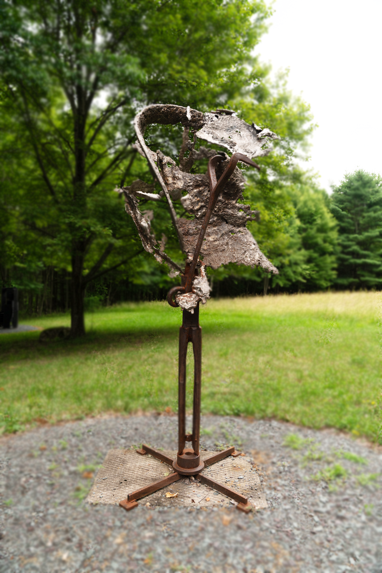 Torrential  - Inspired by the overwhelming intensity of wind and rain. Welded steel, cast stainless, vintage hooks and drill auger. 84” x 34” x 34”. 2022