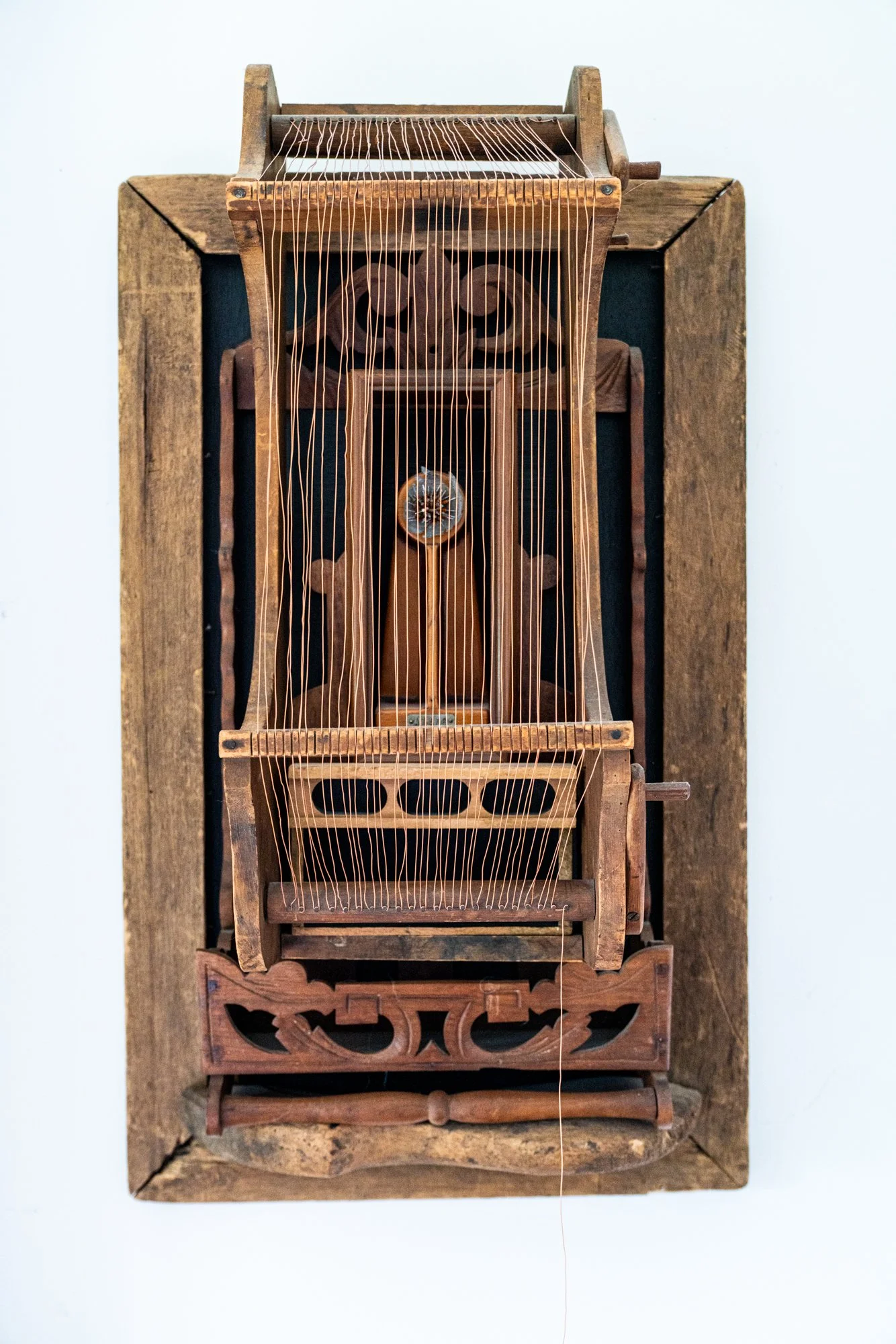 Heirloom - Inspired by a family loom passed down for many generations. Vintage loom, electrical components, brass wire, wood frame and boxes. 32” x 18.5” x 11” 2014