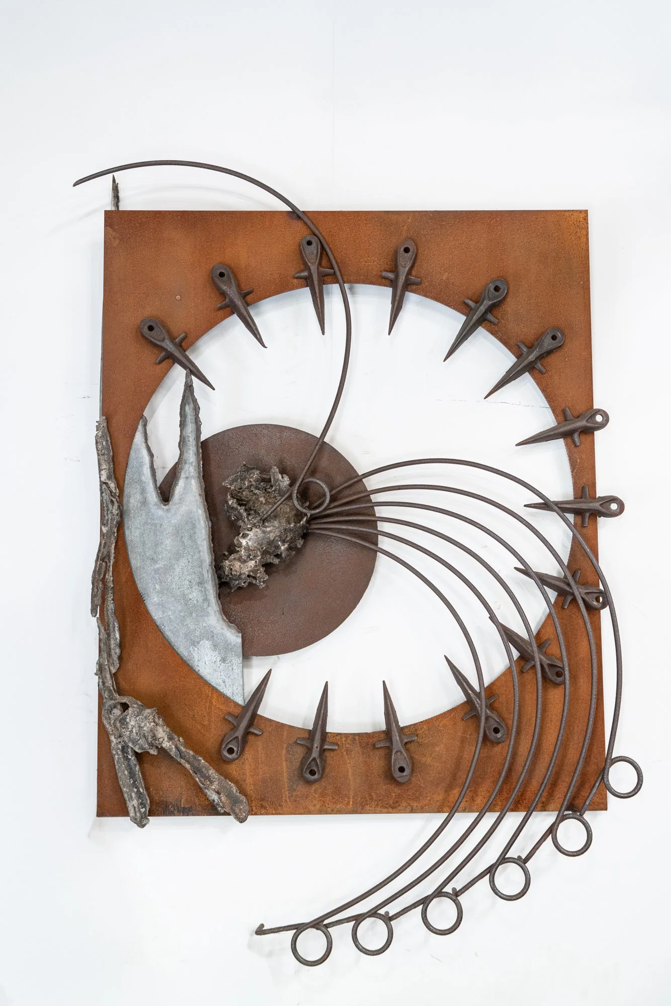 Choices - Inspired by a roulette wheel, this piece incorporates vintage hay rake tines, which were originally utilized to aerate hay prior to baling. Farmers always take a chance with the weather before haying. Welded steel, rake tines, galvanized st