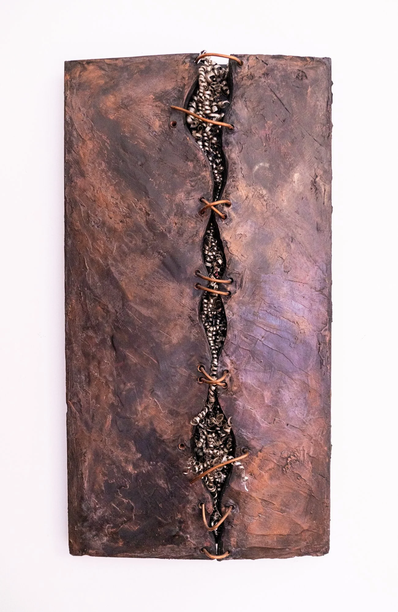 Stuffed - Inspired by my favorite vest. Styrofoam, paint, copper, metal filings.  35” x 19” x 4” 1999
