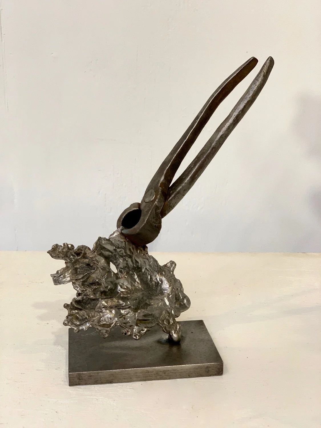 Got it - Inspired by the instructions and dialog that takes place when working together with another person. Cast stainless steel, vintage nipper tool, welded steel. 8” x 6.5” x 2.5”. 2018 (in a private collection)