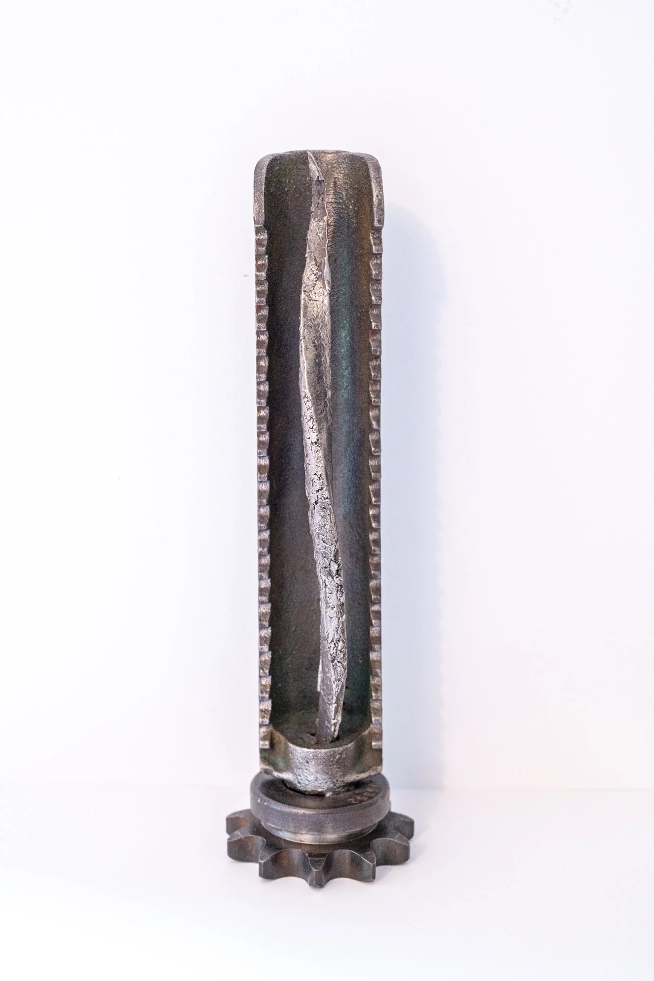 Eternal Flame- Symbolic of undying memory, and hope. Cast stainless steel, industrial gear, machine parts. 14” x 4” x 4” 