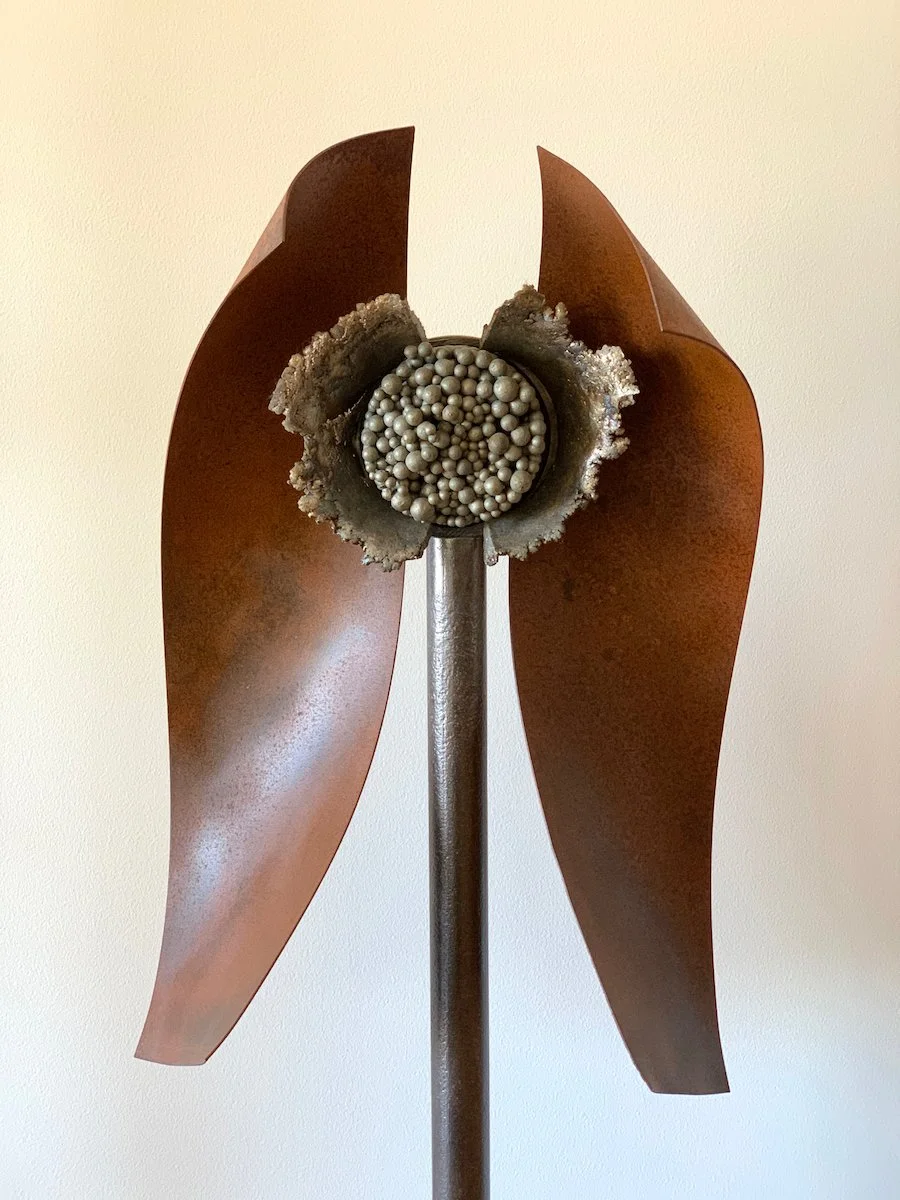 Manifest - Concept of showing or revealing something. Welded steel, cast stainless steel. 64” x 17” x 17”. 1987 