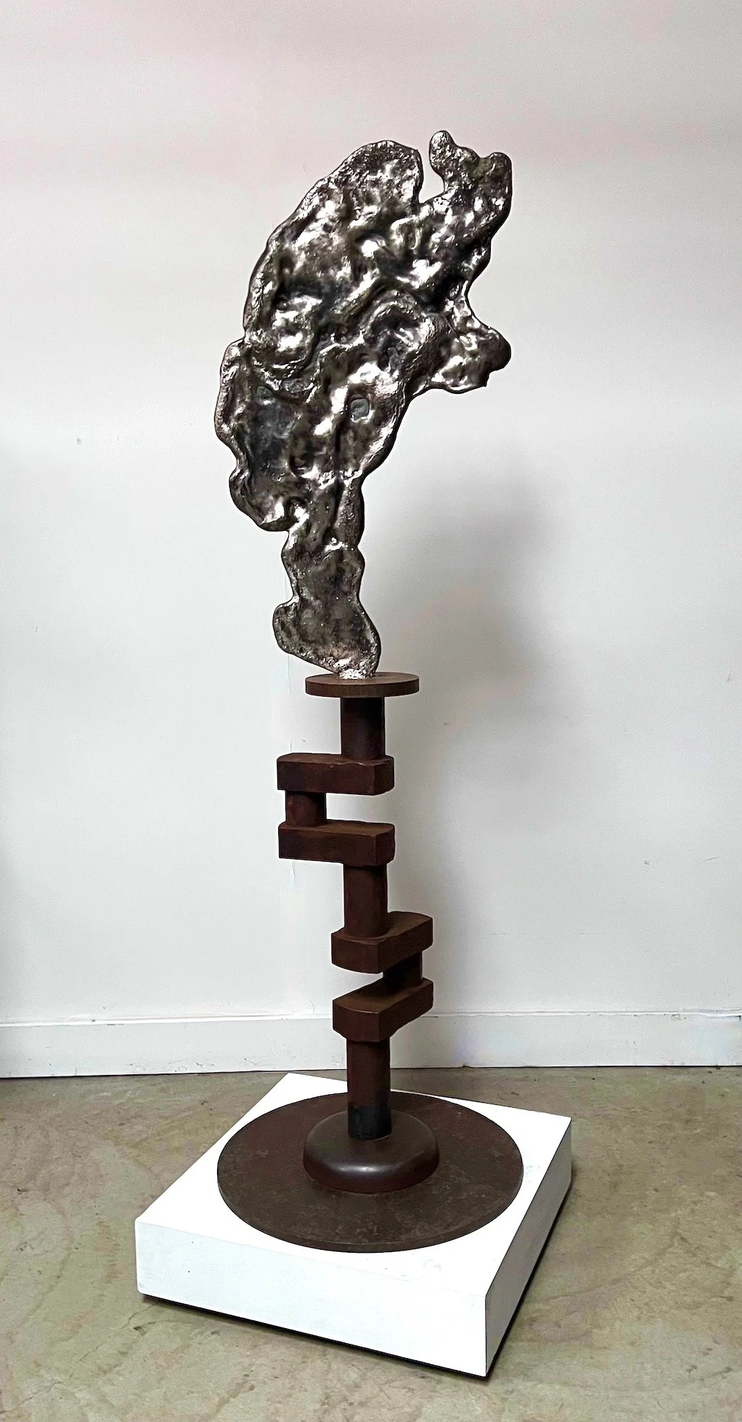 Reciprocation - Inspired by the mutual exchange of energy visually seen in this work. Cast stainless steel, crank shaft from a paddle boat on Rackett Lake in the Adirondacks. 6’5” x 24” x 24”. 2021.