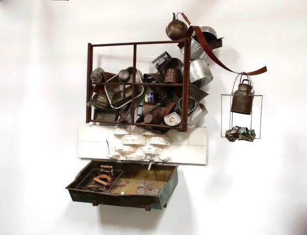 Domestic Withdrawal / Multitasking - Inspired by doing required mundane tasks while dreaming to escape. This installation is still under construction. 
Vintage metal window frame, vintage pots & pans, tea kettle,  copper sink, modeled clay masks. ( M
