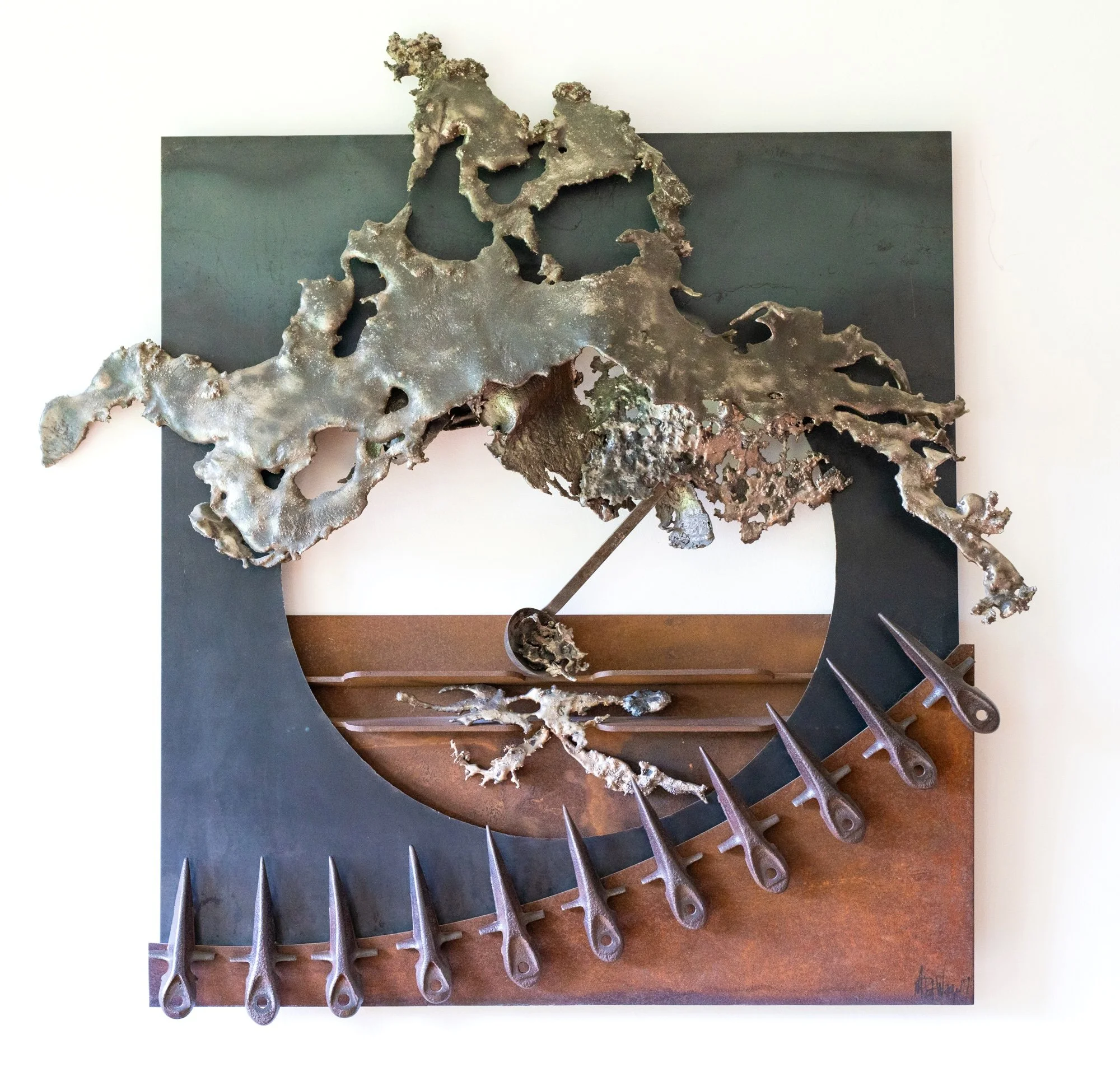 Final Distribution - The metal ladle inspired the composition of this piece. Inspired by food pantries that feed those in need. Metal ladle, cutter bar blades, steel, cast stainless steel. 3’6” x 4’ x6” 1995
