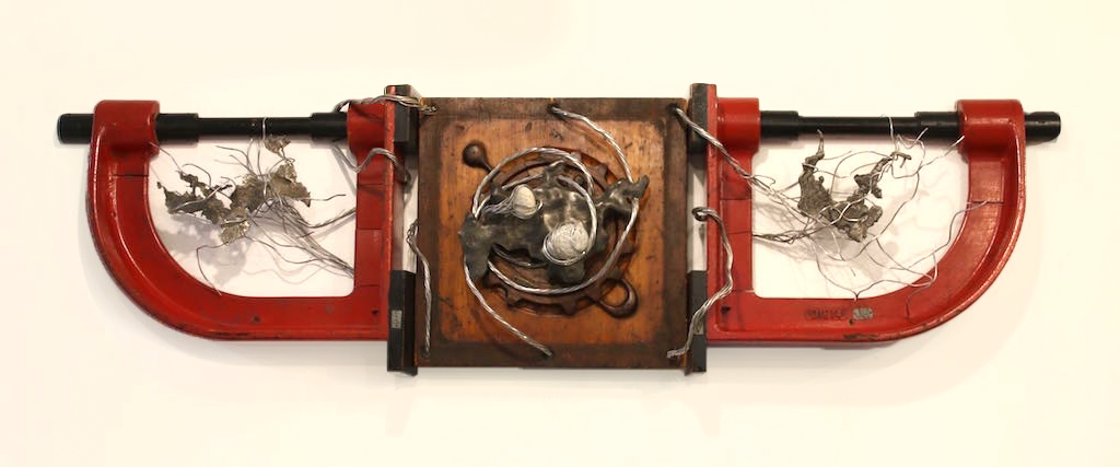 Co-Joined - Inspired by the process of two major entities converging, resulting in a permanent link and the creation of two new, distinct entities. Wood pattern pieces, aluminum wire, rocks, cast stainless steel. 16” x 40” x 7”. 2016 (in a private co