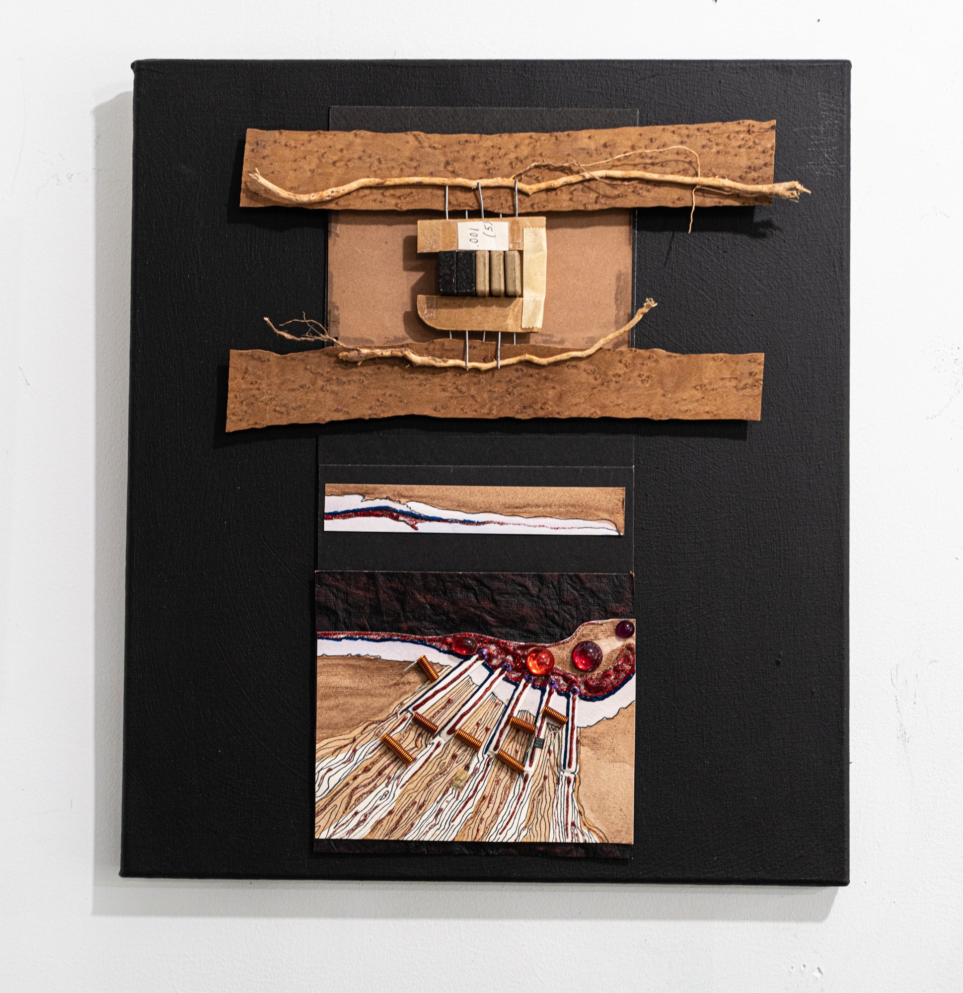 Point of View  - Composition exploring spatial relationships of distant view vs. macro view. Painted cardboard, electrical components, roots, glass beads.  16” x 12’ x 2” 2009
