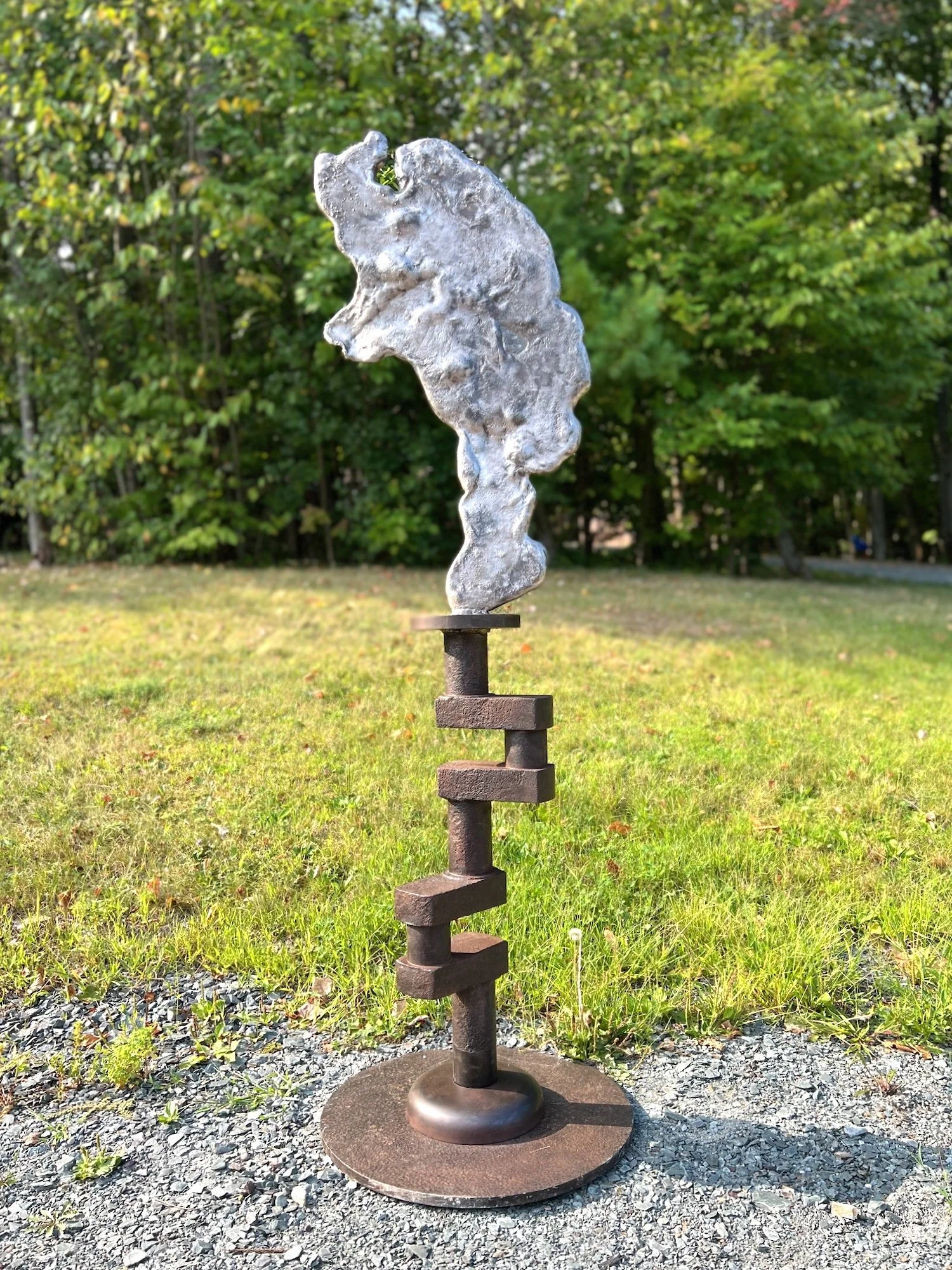 Reciprocation -  Inspired by the concept of equal forces of energy. Cast stainless steel, crank shaft from a paddle boat on Rackett Lake in the Adirondacks. 6’5” x 24” x 24”. 2021.