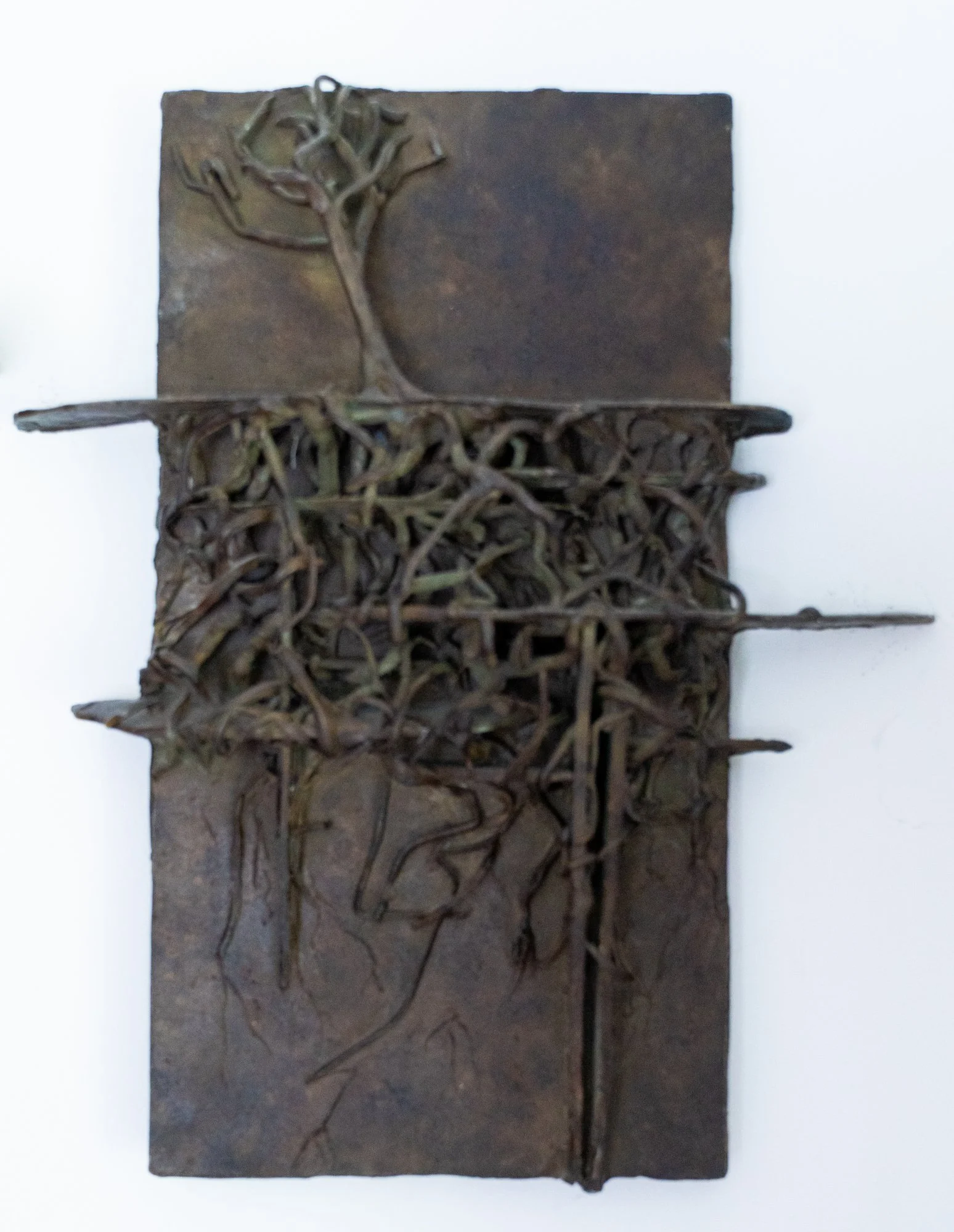 Homage to the Dead and Dying Elm - The road I live on served as the inspiration for this piece, it was once bordered by magnificent Elm trees until the Dutch Elm blight began to destroy them. Cast Bronze. 10.5” x 9” 2”. 1979
