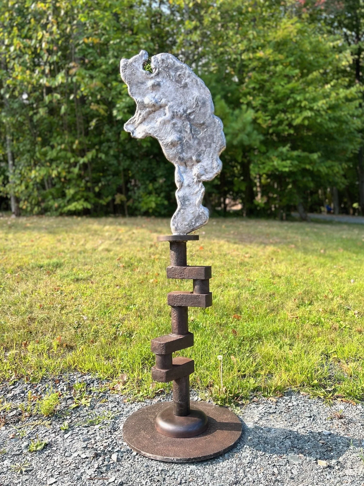 Reciprocation - Inspired by the mutual exchange of energy visually seen in this work. Cast stainless steel, crank shaft from a paddle boat on Rackett Lake in the Adirondacks. 6’5” x 24” x 24”. 2021.