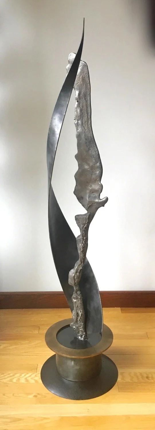 Free Flow -  Inspired by the sense of continuous, flowing visual movement. Brass, cast stainless steel, welded steel. 53” X 11” x 11”. 1991 (In a private collection.)