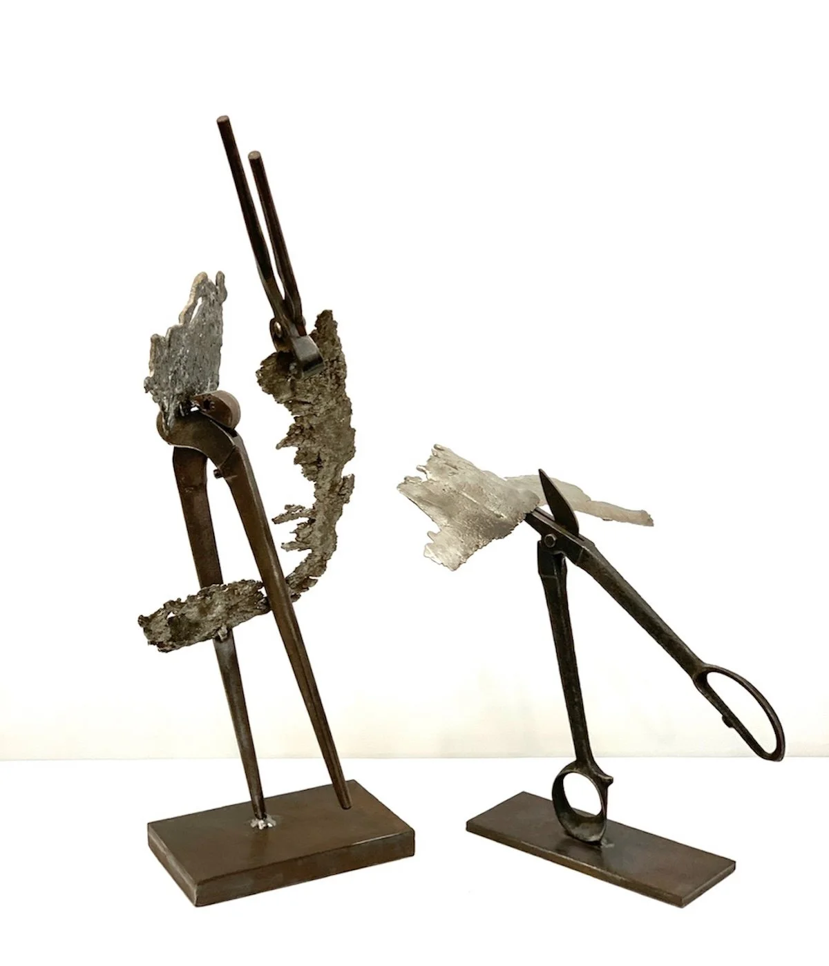 Tool Dancer - Inspired by the expressive nature of tools, Vintage industrial scissors, cast stainless steel, welded steel. 13.75” x 12.25” x 15”. 2020