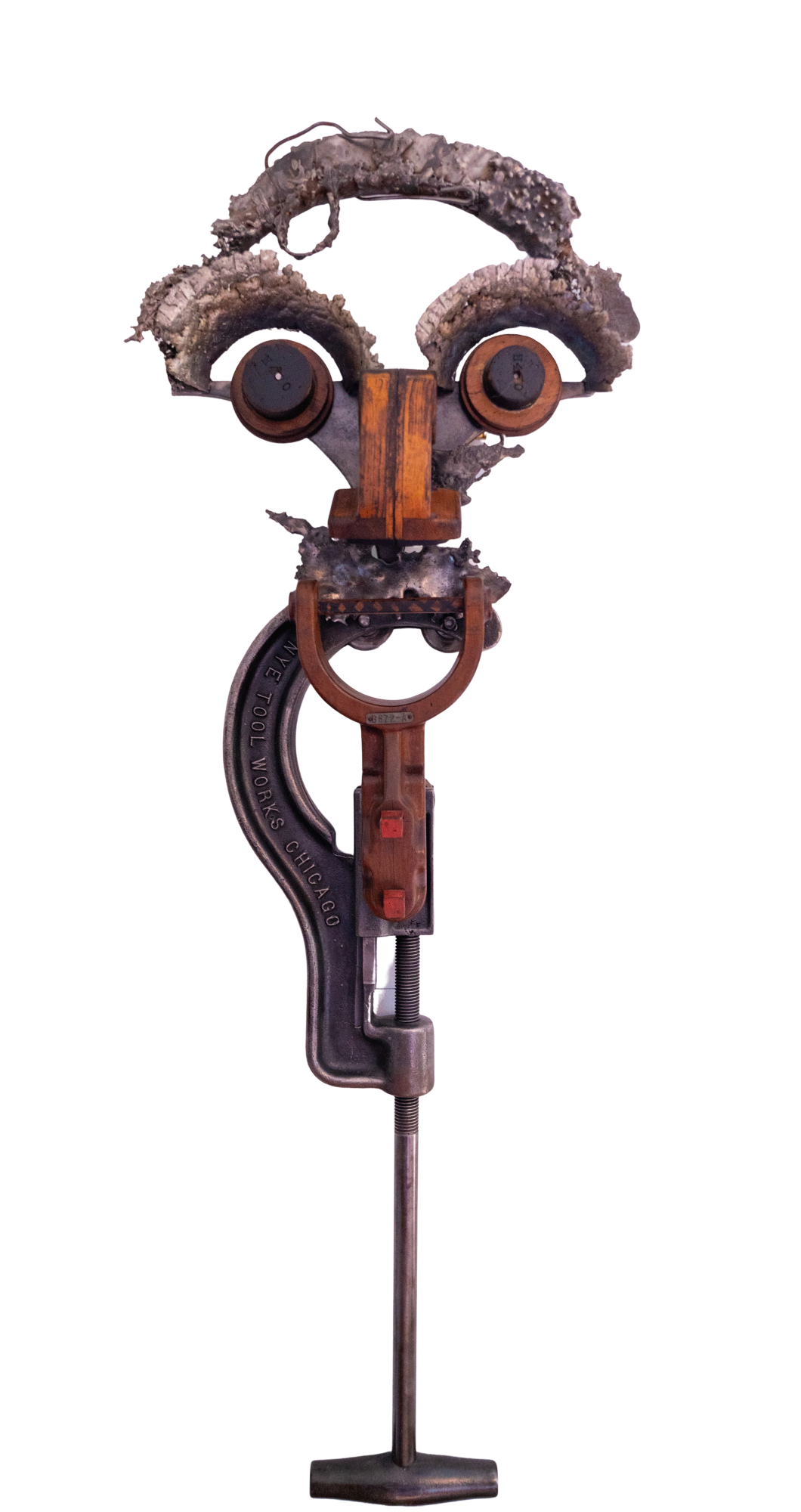 Elmer - Inspired by the image of Professor Lawson. Vintage pipe cutter, wood pattern pieces, cast stainless steel. 47” x 17” x17”. 1999