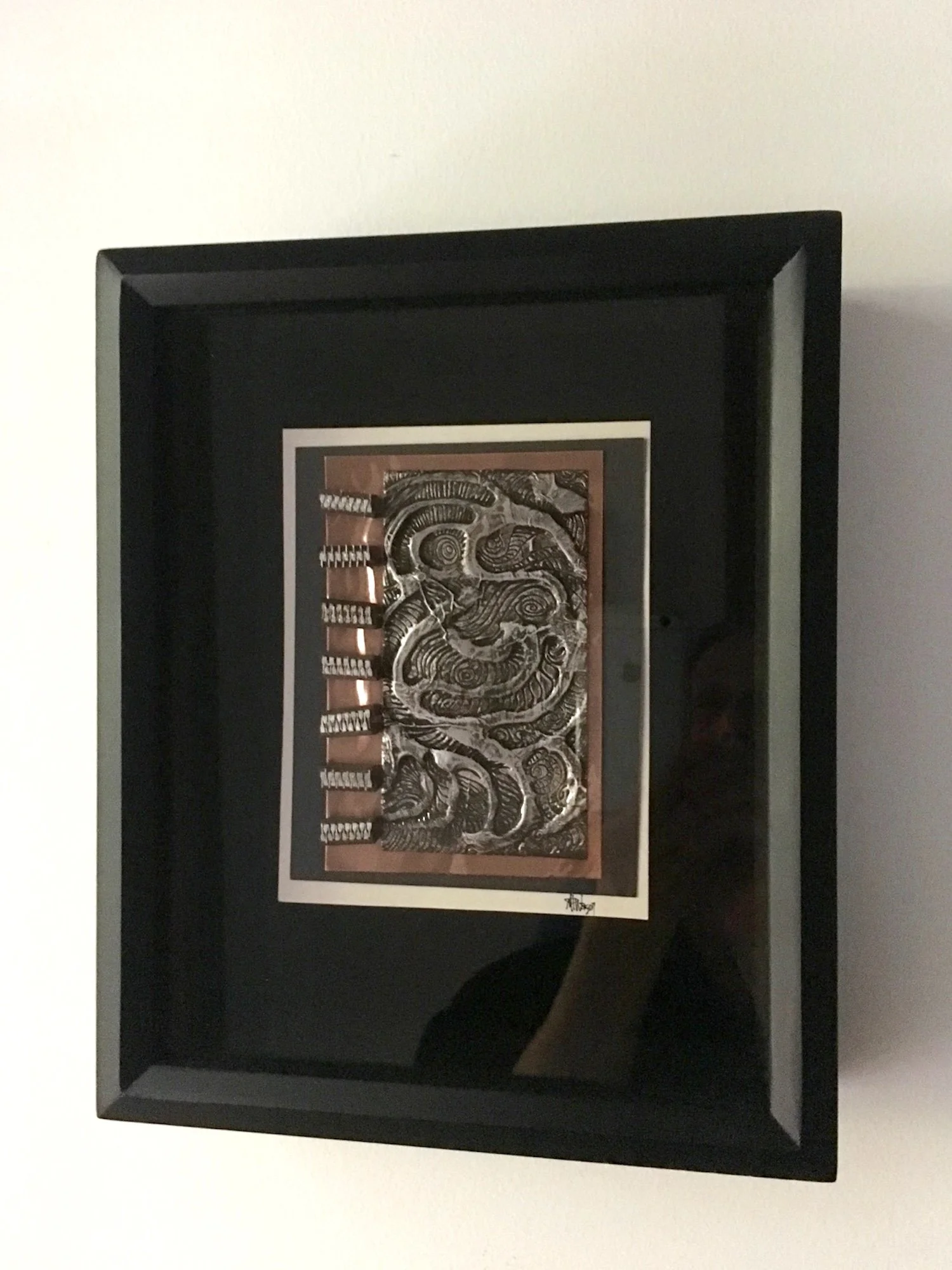 Collage - The inspiration for this work originated from the interplay and contrast between form and shape. Electrical components, paper, steel. 12” x 8” x 2”. 2016