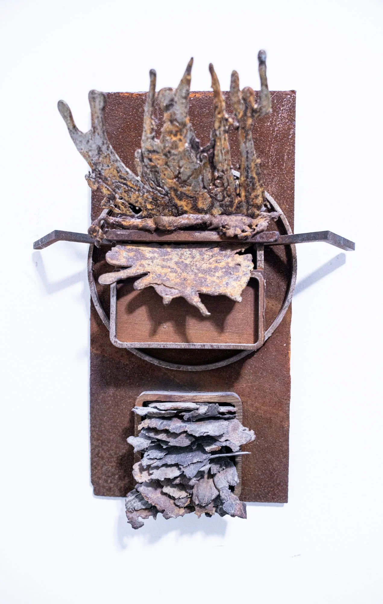 Badge - A three dimensional interpretation of a family crest. Cast and patina stainless and welded steel. 12’ x 10” x 3.5” 1978