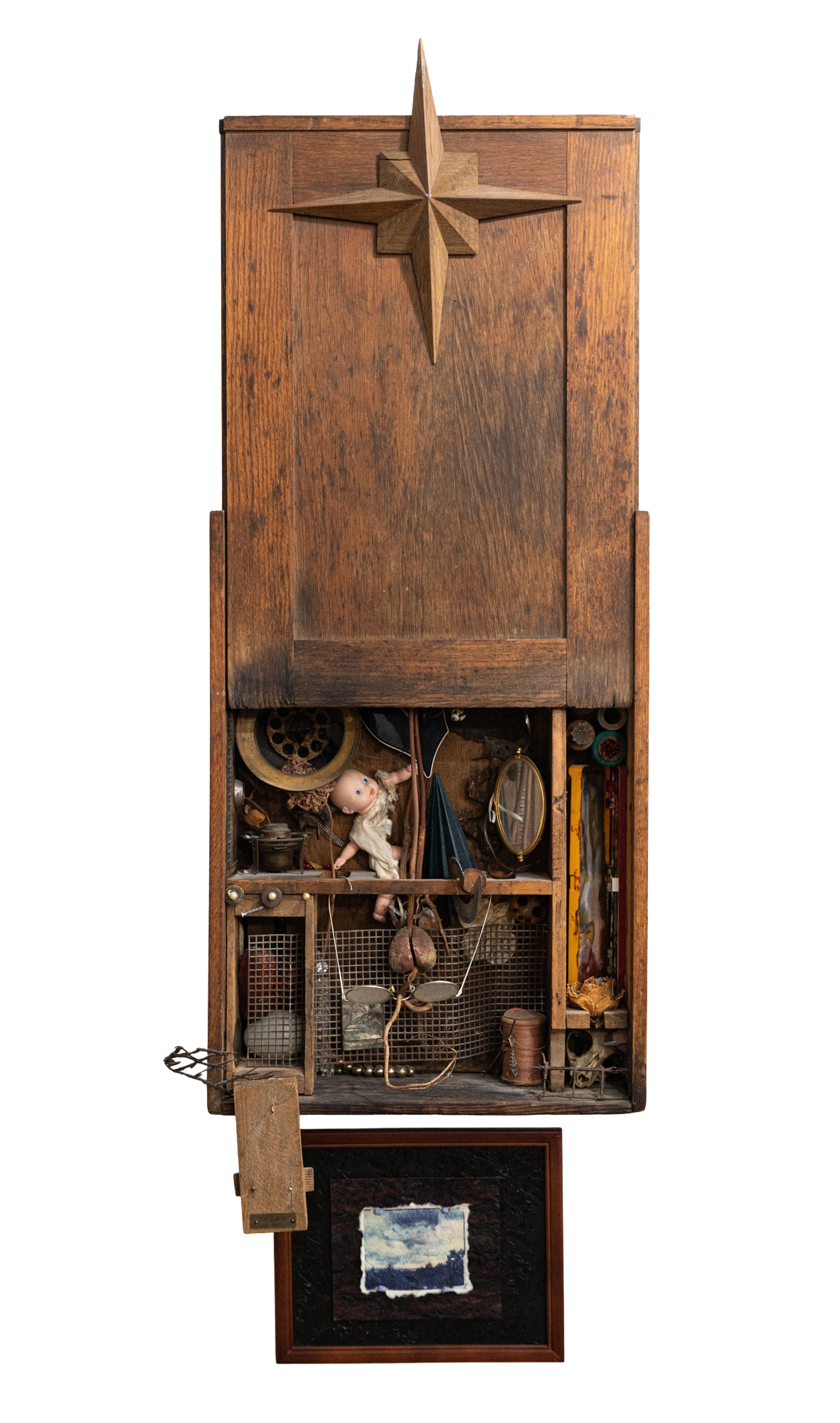 Grandma Brown’s Christmas - Inspired by the remnants of my grandparent’s house after family members had taken what they wanted. Vintage wood boxes, doll, glasses, metal, avocado pit. 44” x 24” x 6” 1977
