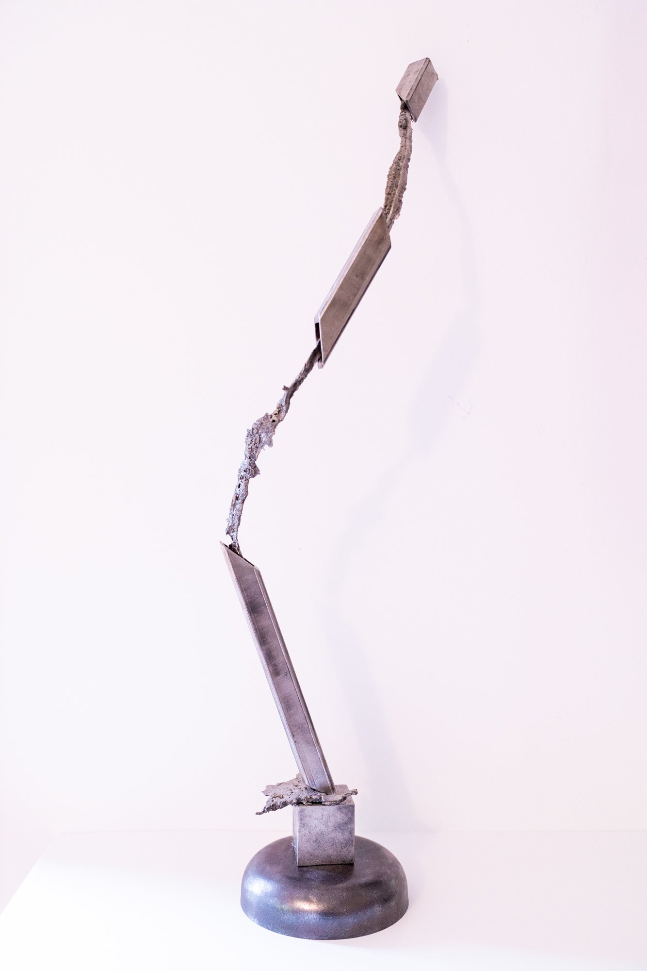 Channel - Inspired by the conducting, funneling, steering, towards a specific goal. Cast stainless, welded steel. 31” x 9” x 6”. 2019