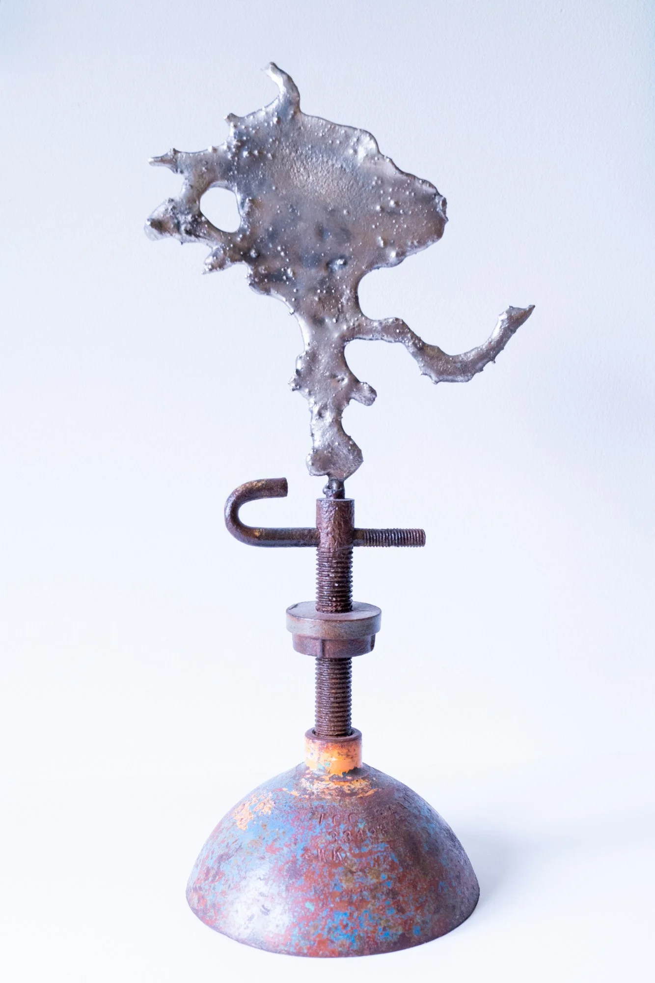 Flare Bloom - Inspired by the concept of controlling gas. Cast stainless steel, tank top, steel, industrial screw. 21’ x 10” x 7.75” 2020