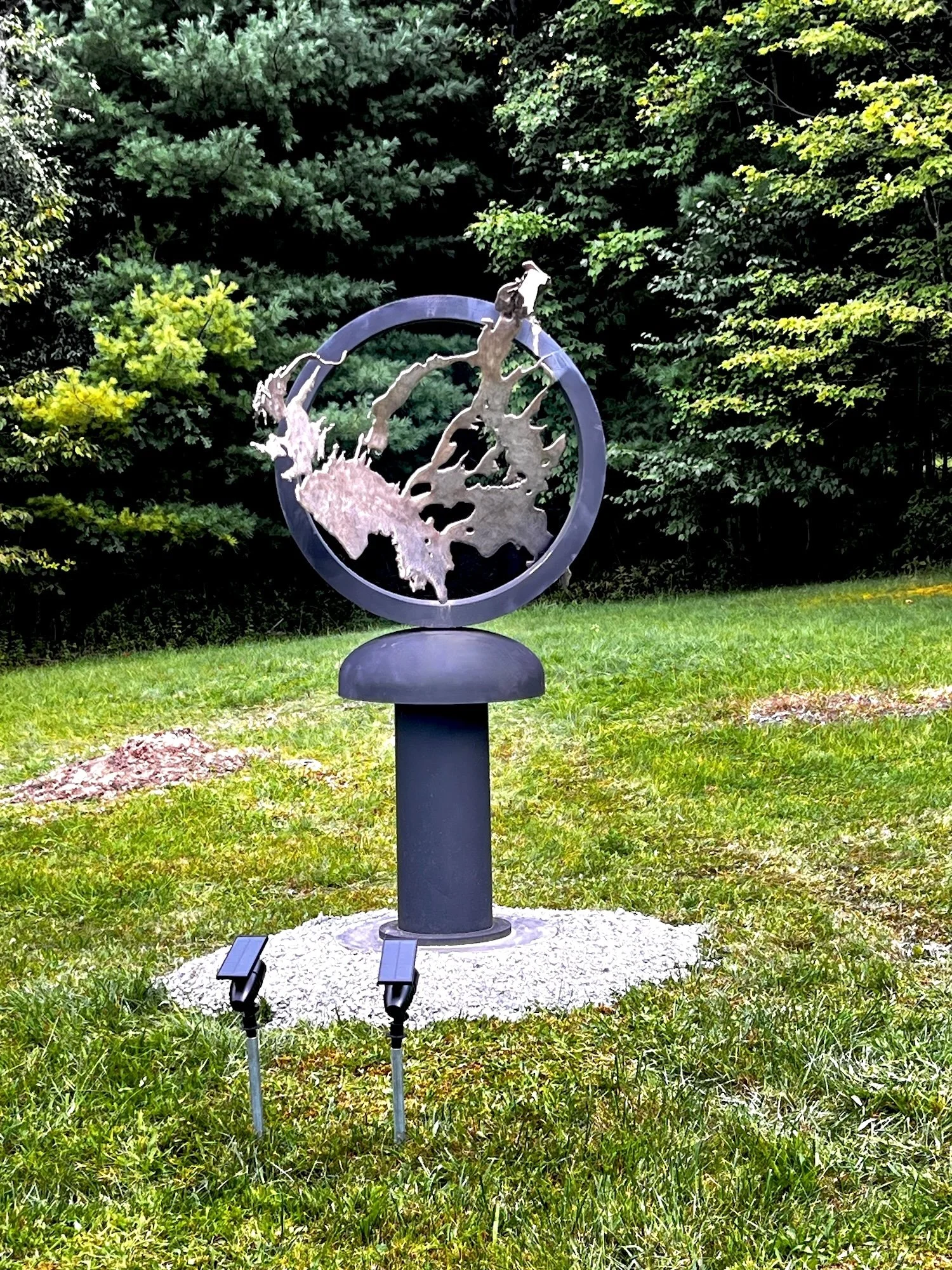 Central Essence - Inspired by the striking, beautiful form at its center, which is crafted from cast stainless steel. Welded steel, cast stainless steel, deconstructed tanks.  7'6" x 4' x 4'.  2009