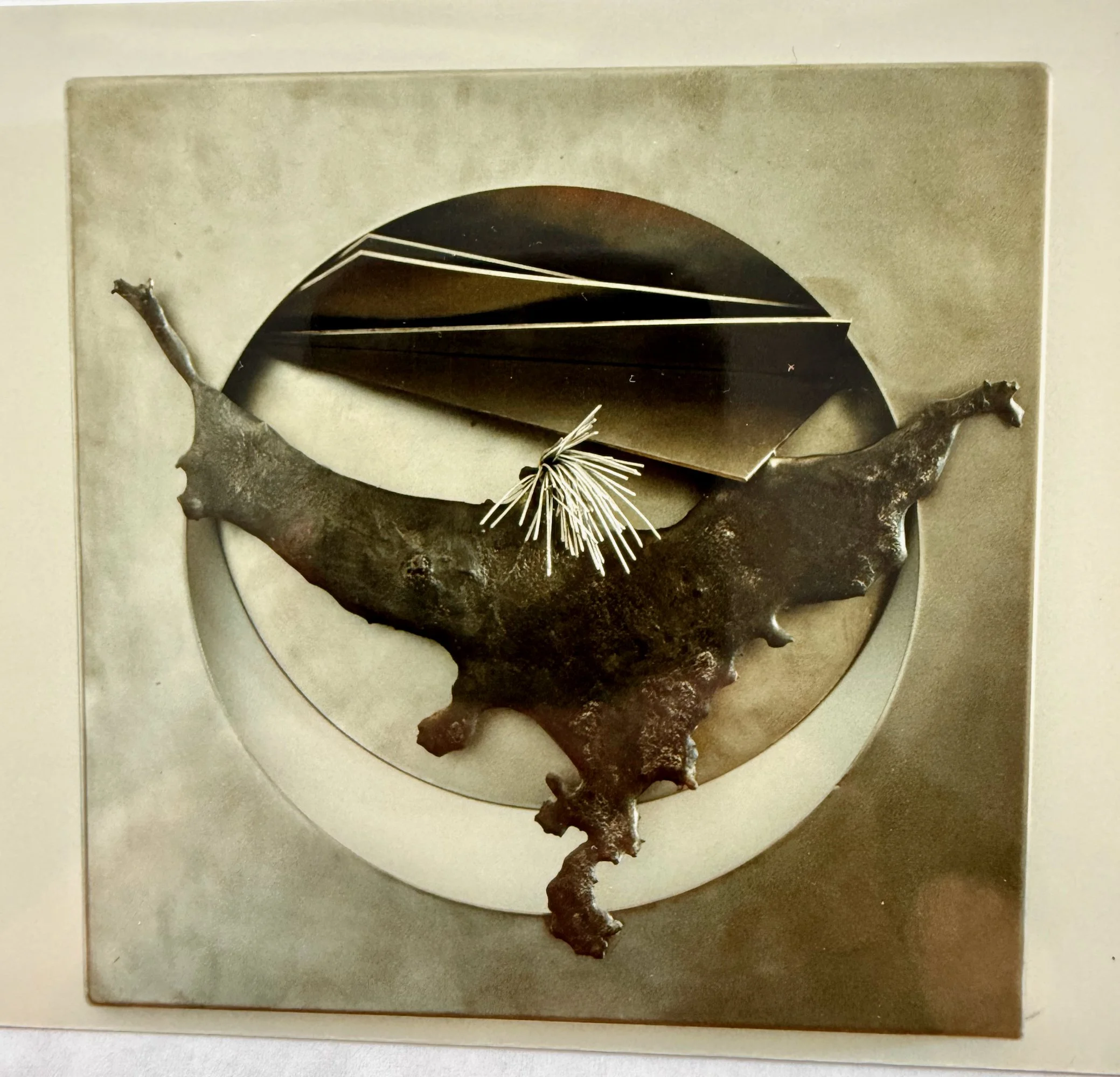 Screaming Trails - Inspired by the lasting effects of a revelation. Welded stainless steel, aluminum wire. 21” x 21” x 5”. 1989 (in a private collection)