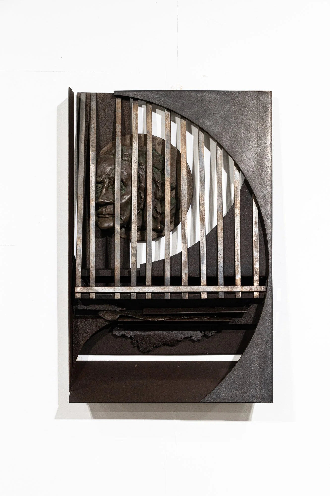 Final Vision / Anna - The bronze image in this piece is a casting I created of my great Aunt Anna. In her final years, she became a prisoner of her arthritic ridden body. She had a long creative life making beautiful tattings which adorned numerous c