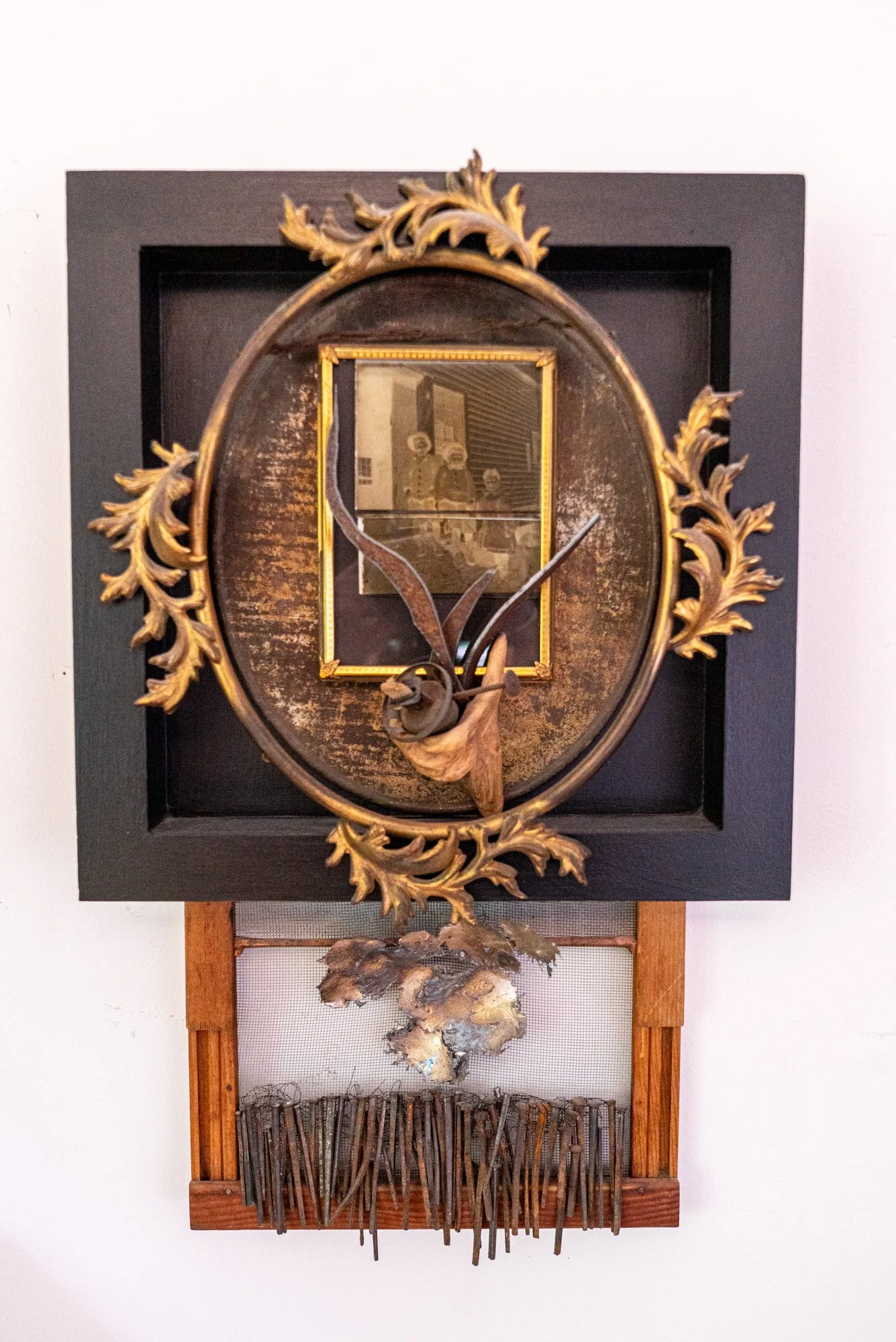Brothers Three - Inspired by a photo negative that reminds me of my three younger brothers. Brass frames, vintage photo negative, wood, steel, window screen, horse shoe nails. 24” x 15” x 4.5” 2019.