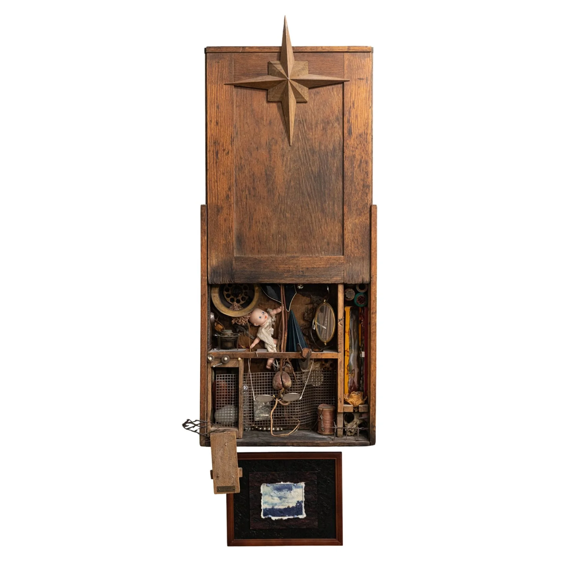 Grandma Brown’s Christmas - Inspired by the remnants of my grandparent’s house after family members had taken what they wanted. Vintage wood boxes, doll, glasses, metal, avocado pit. 44” x 24” x 6” 1977
