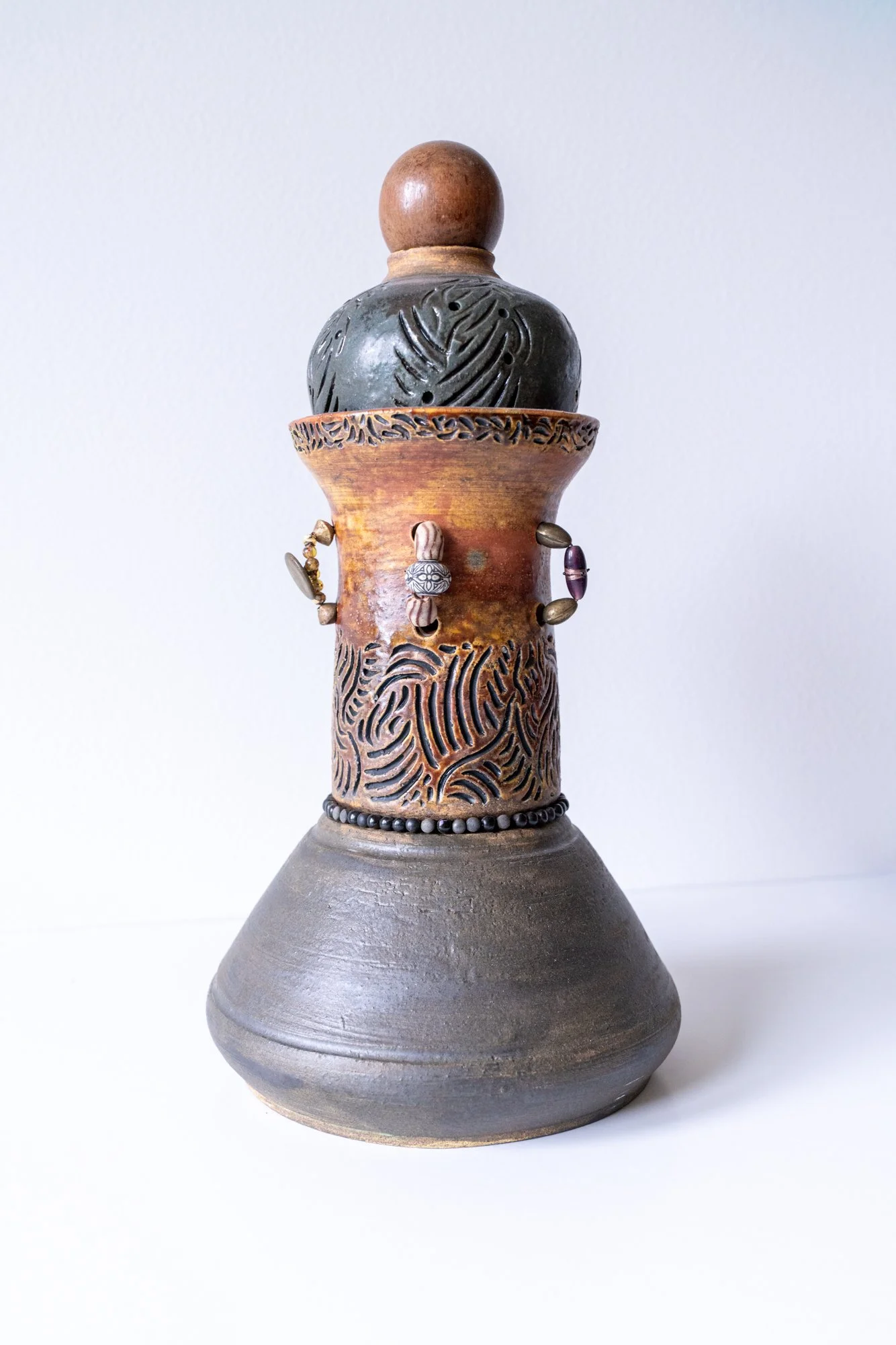 CT/V3 - (Clay Totem Vessel #3) - Braided Locks  Totem - intuitively assembled. 3 clay thrown pots, 1 carved, transistors, braided wire, watering can spout, metal finial. 16” x 7” x7”. 2024
