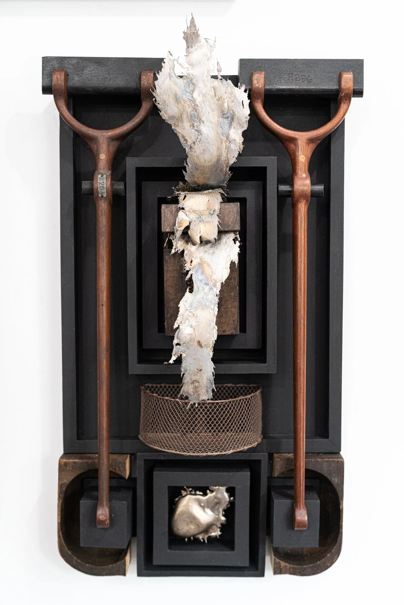 Transformation - Concept of dramatic change in form. Wood pattern pieces, wood frames, wood match holder, wire basket, cast stainless steel
 22” x 13.25” x 5”. 2025
