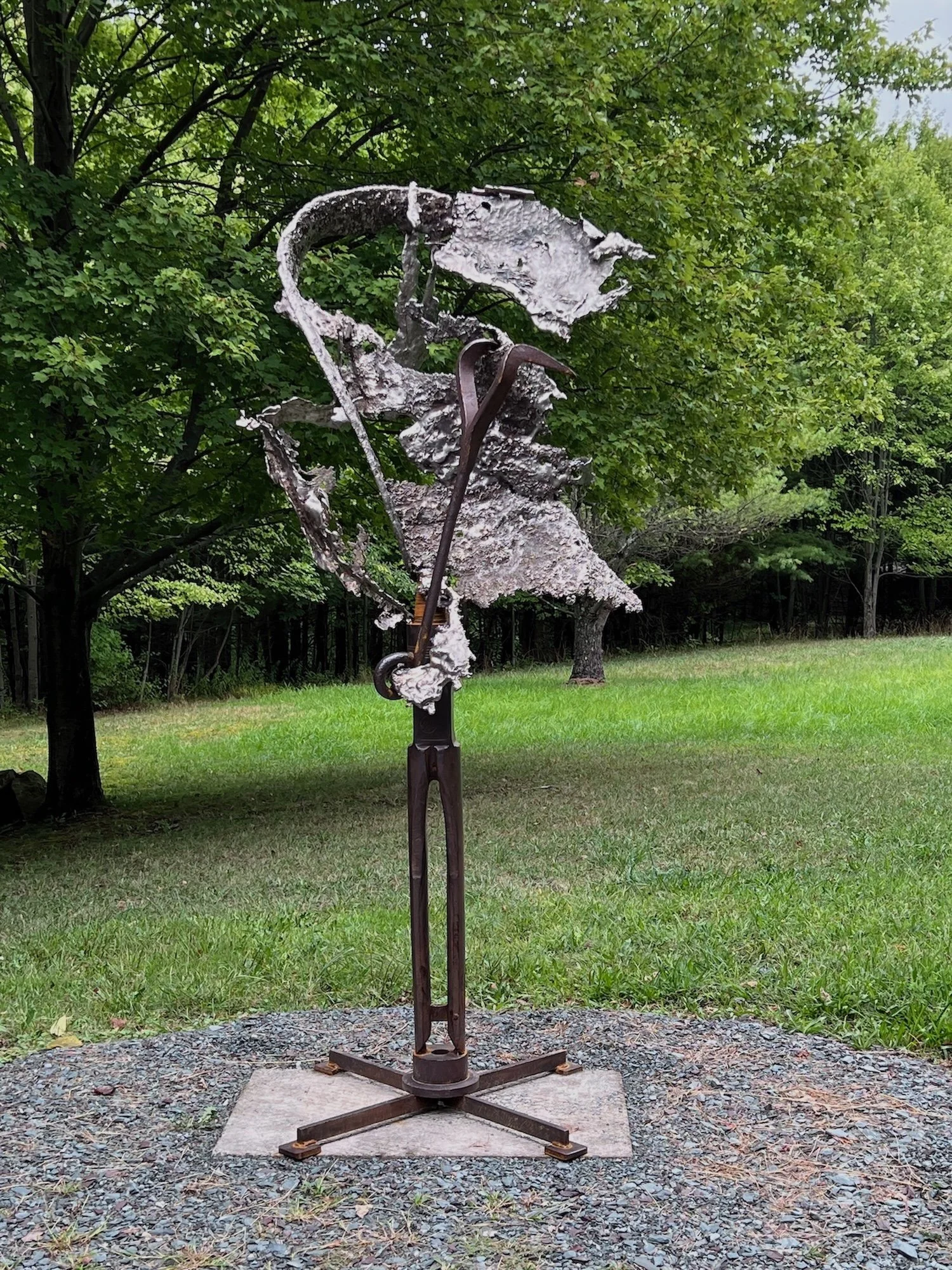 Torrential - Inspired by the intense, violently severe effects of wind. Vintage well drilling bit, cast stainless steel, vintage tools. 84” x 34” x 34” . 2022