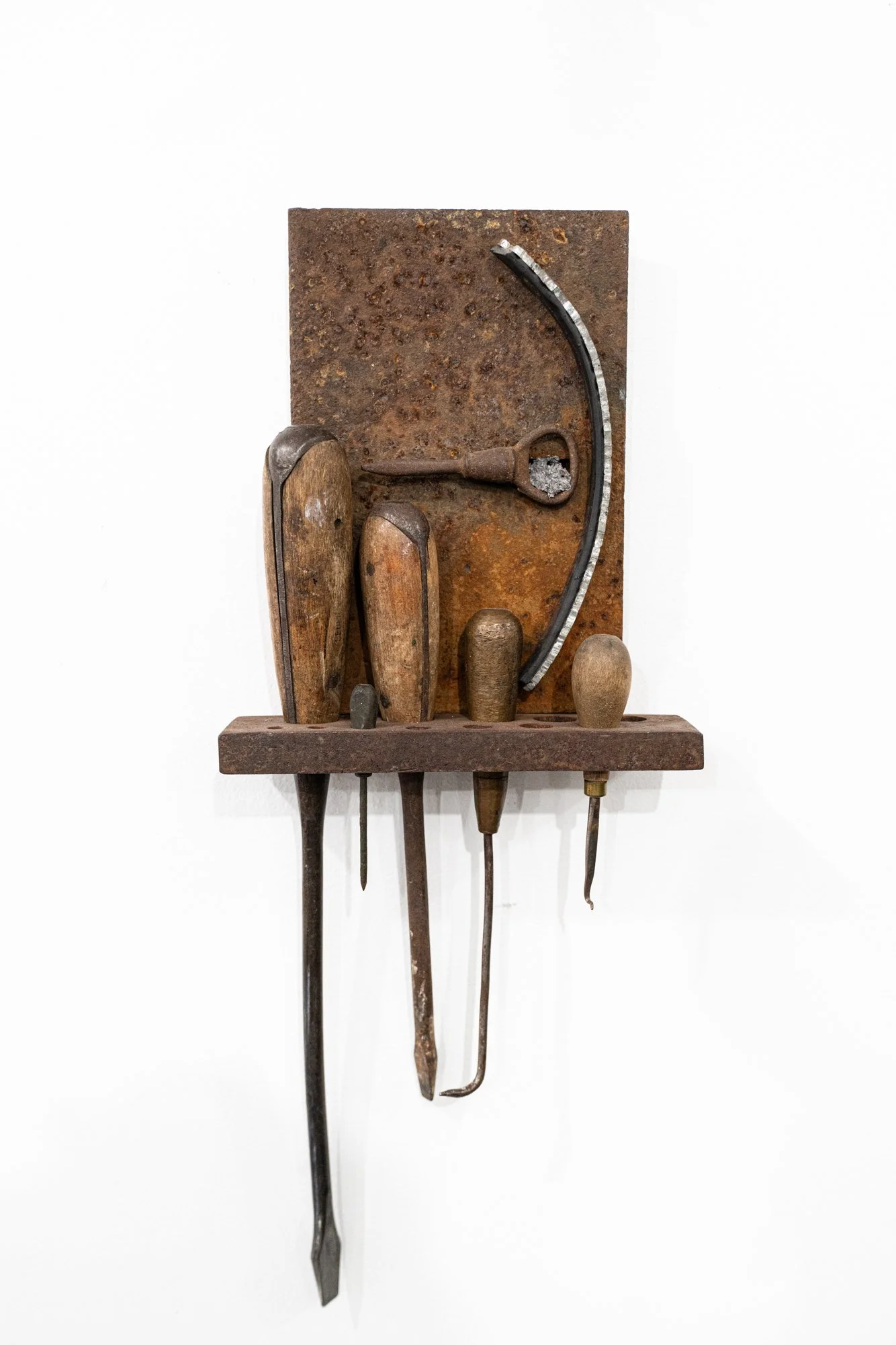 Against the Edge - Inspired by vintage tools. Steel, glass, rubber, vintage tools. Wall relief measuring 9.5” x 8” x 2.5”. 2014