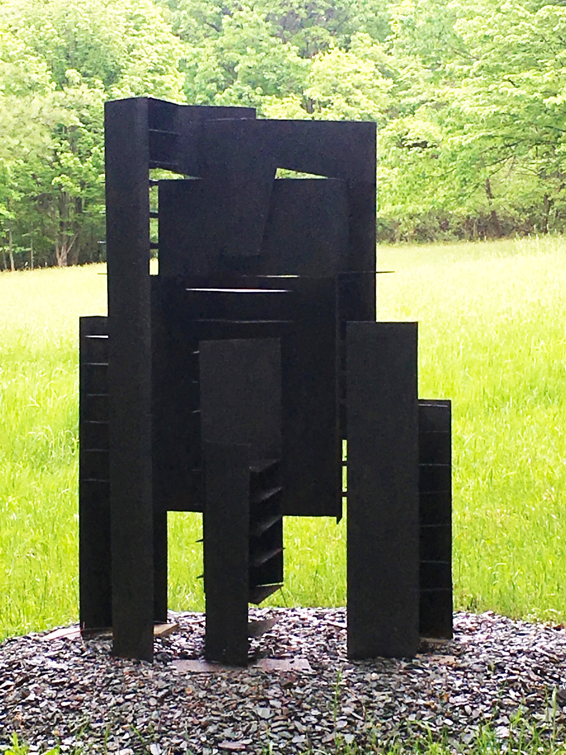 Shifting Planes - A formal construction influenced by positive & negative areas. Welded & painted steel. 65” x 48” x 36”. 1885