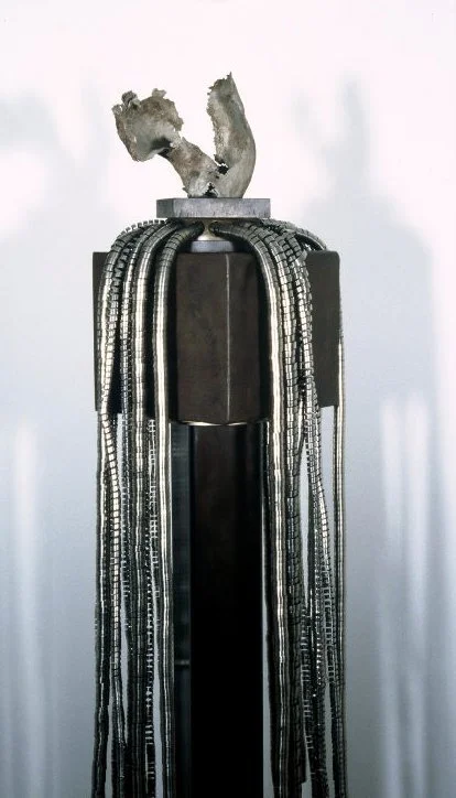 Illuminator - Inspired by the idea of enlightenment. Welded steel, stainless coils and cast stainless. 6’ x 4’ x 4’.1988. (in a corporate collection)