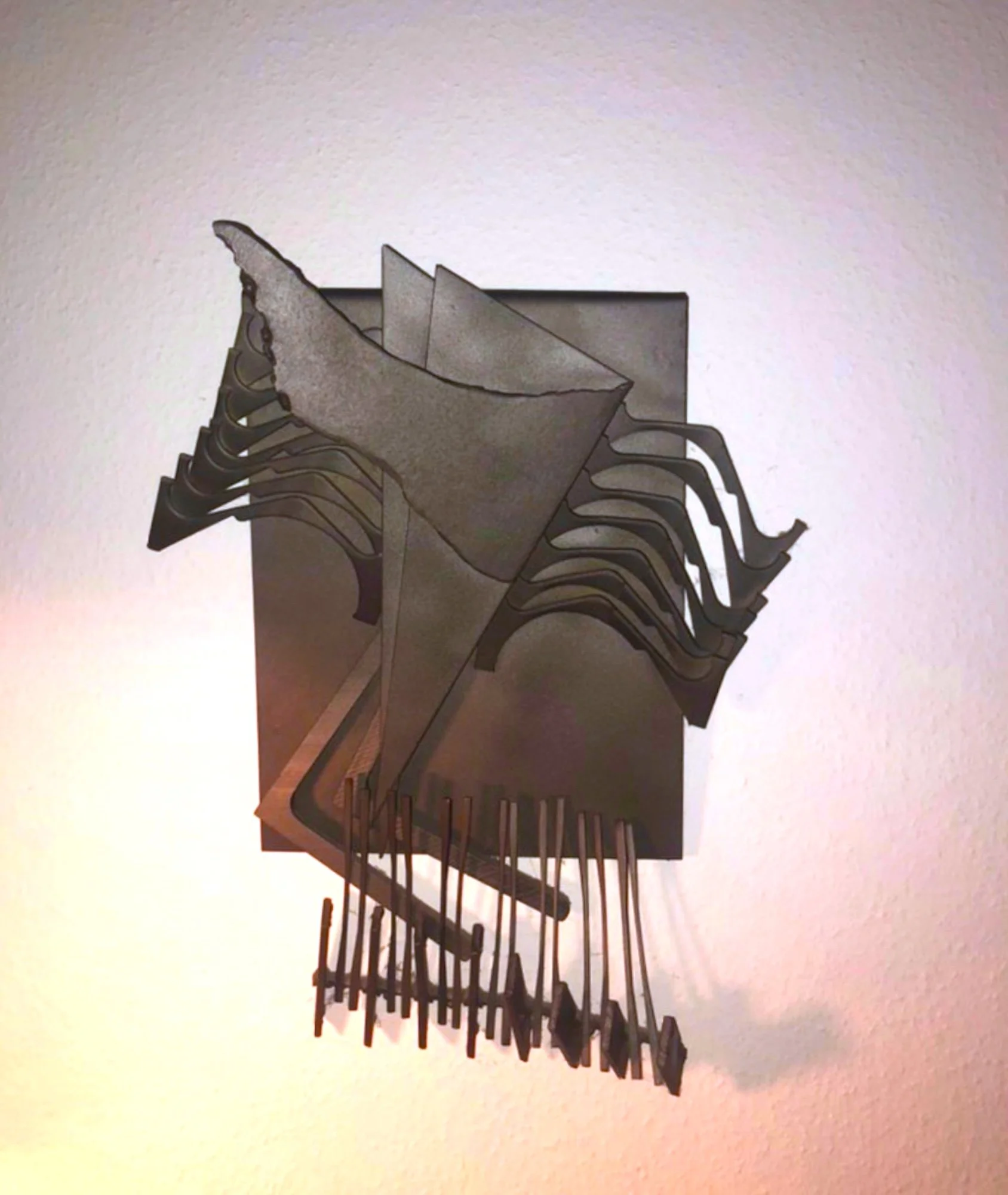 Winged Figure II - Inspired by the symbolism of wings representing freedom, speed, diversity, and the soul’s journey. 16” x 14” x 3”. 1980. (in a private collection) 
