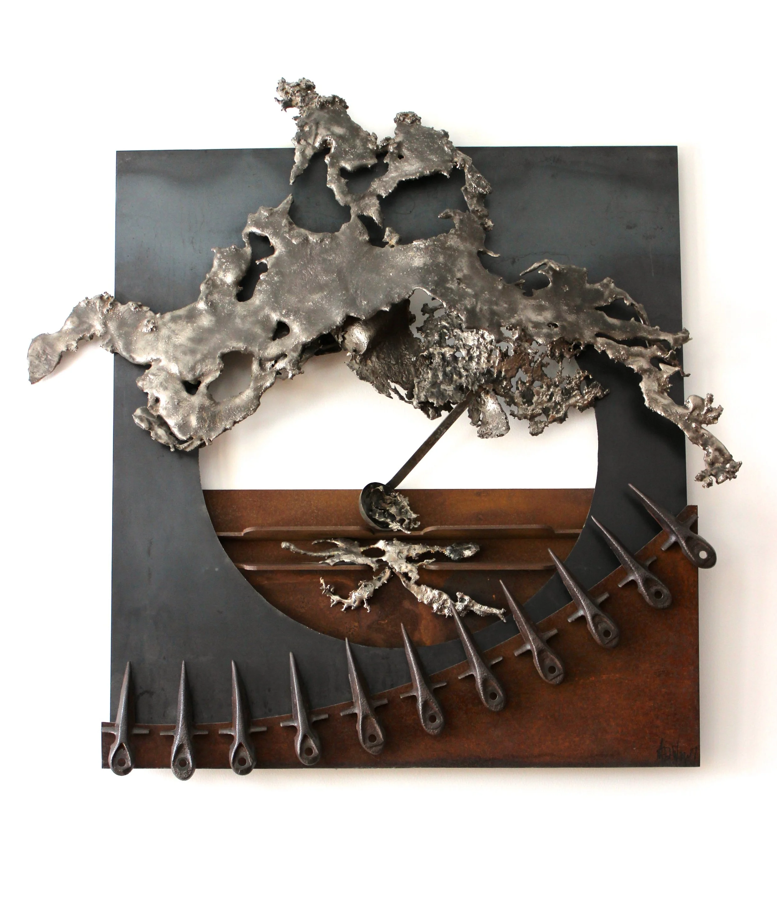 Final Distribution - The metal ladle inspired the composition of this piece. Inspired by food pantries that feed those in need. Metal ladle, cutter bar blades, steel, cast stainless steel. 3’6” x 4’ x6” 1995