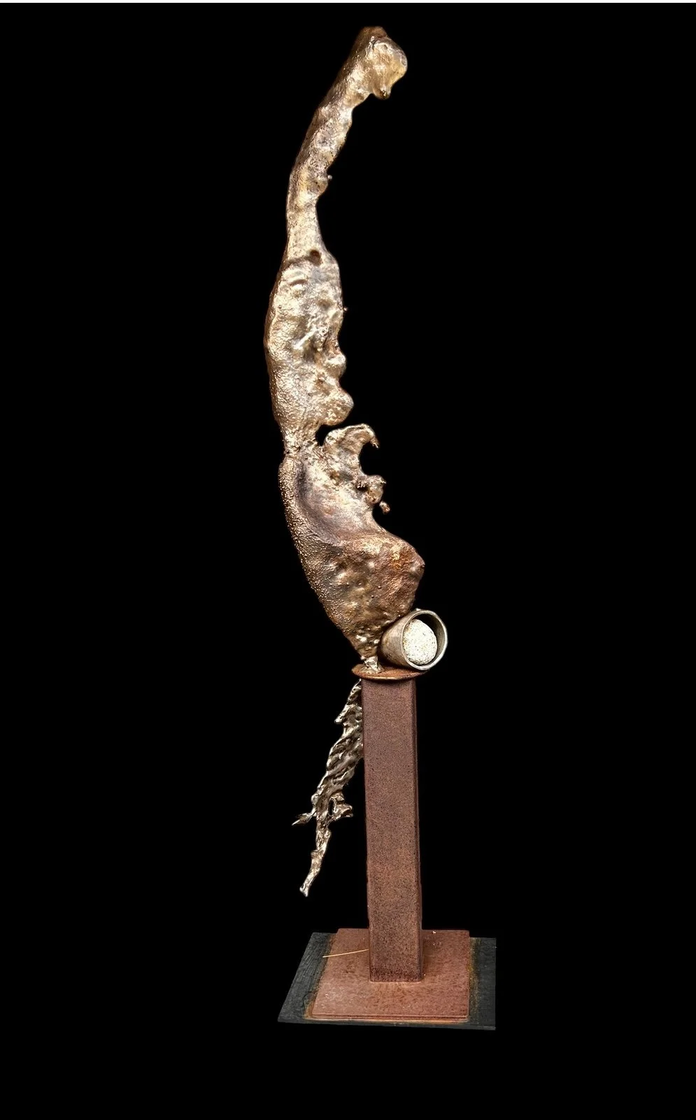 Freeze Flow - This sculpture explores the dynamic contrast between the implied, organic flow of molten steel and rigid, geometric forms. A river rock is incorporated to accentuate this visual dialogue. Cast stainless & mild steel, rock. 71” x 15” x 1