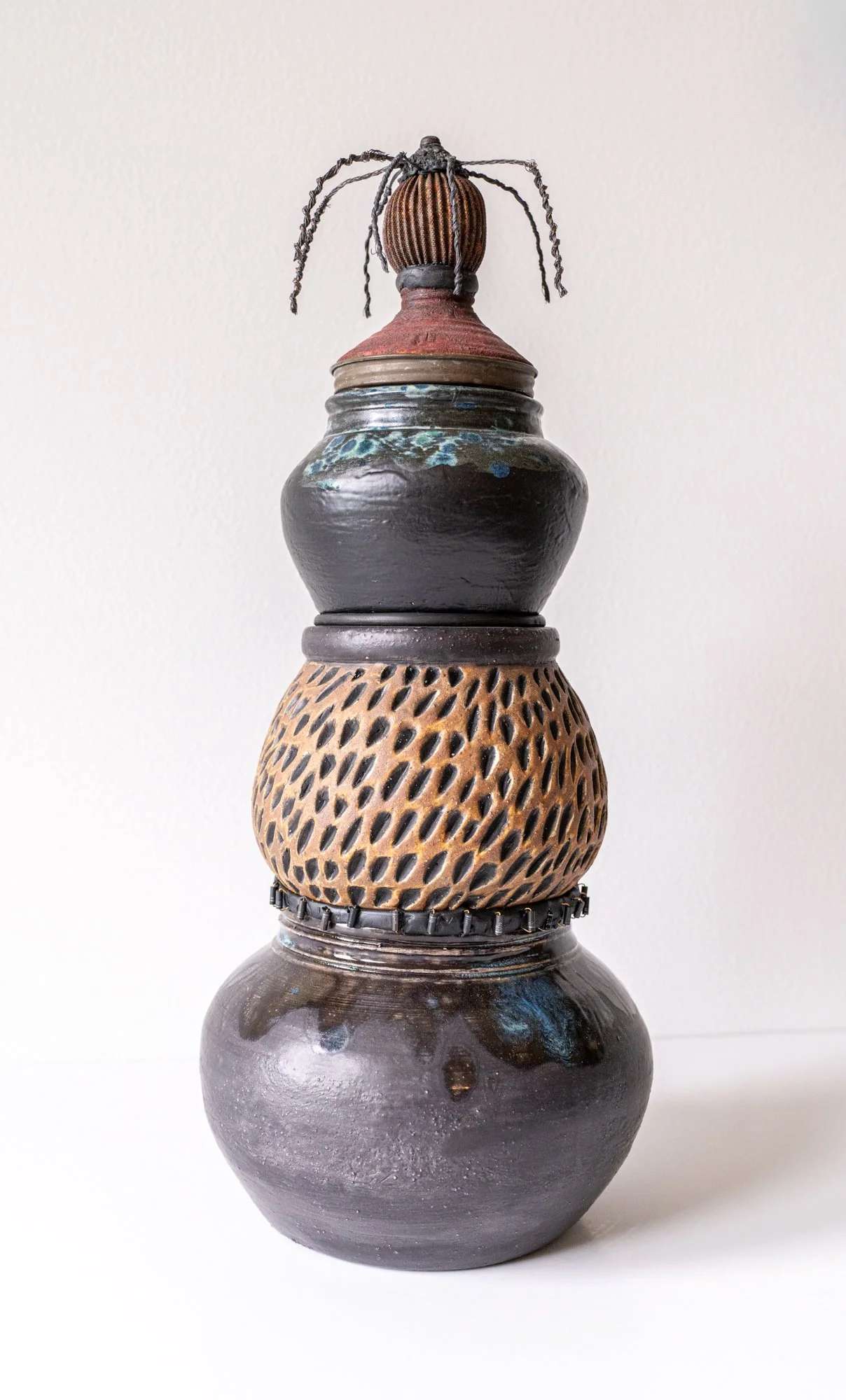 CT/V3 - (Clay Totem Vessel #3) - Braided Locks  Totem - intuitively assembled. 3 clay thrown pots, 1 carved, transistors, braided wire, watering can spout, metal finial. 16” x 7” x7”. 2024